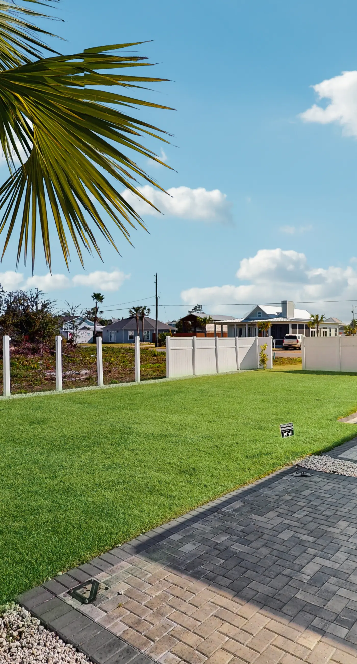 Dog friendly, coastal retreat with fenced yard, private pool, golf cart and cove