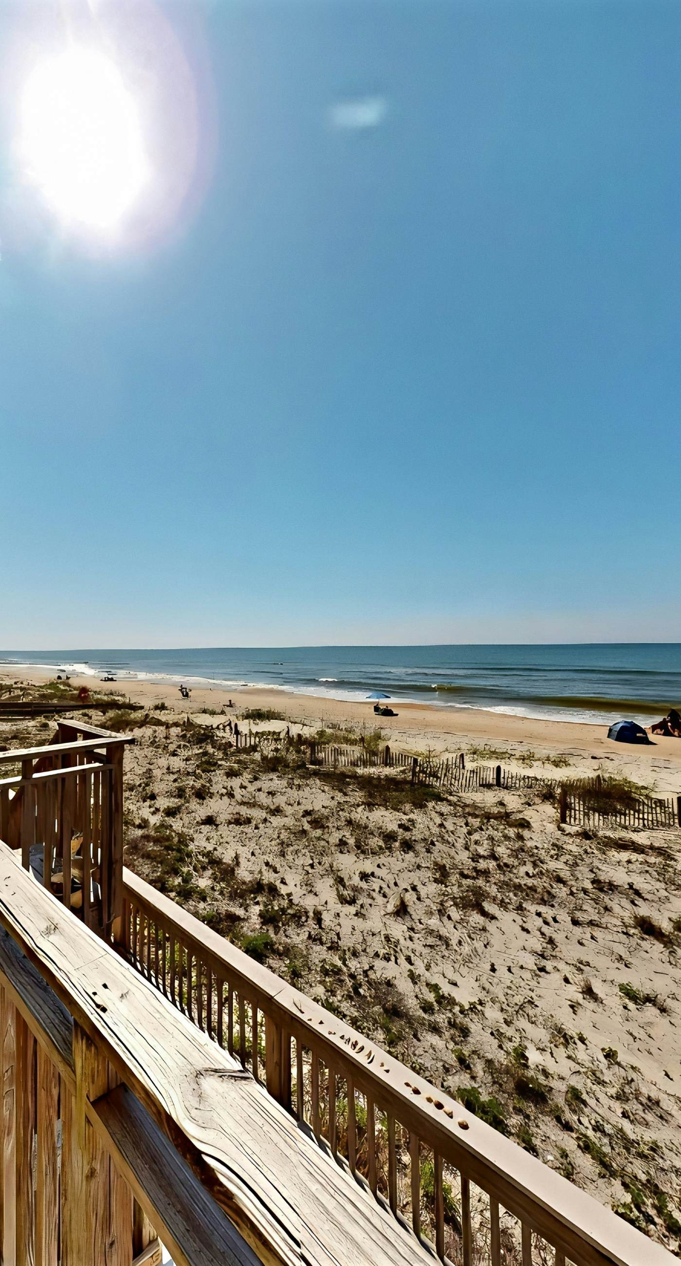 Dog-friendly beachfront townhouse with comunity pool, washer/dryer, central AC