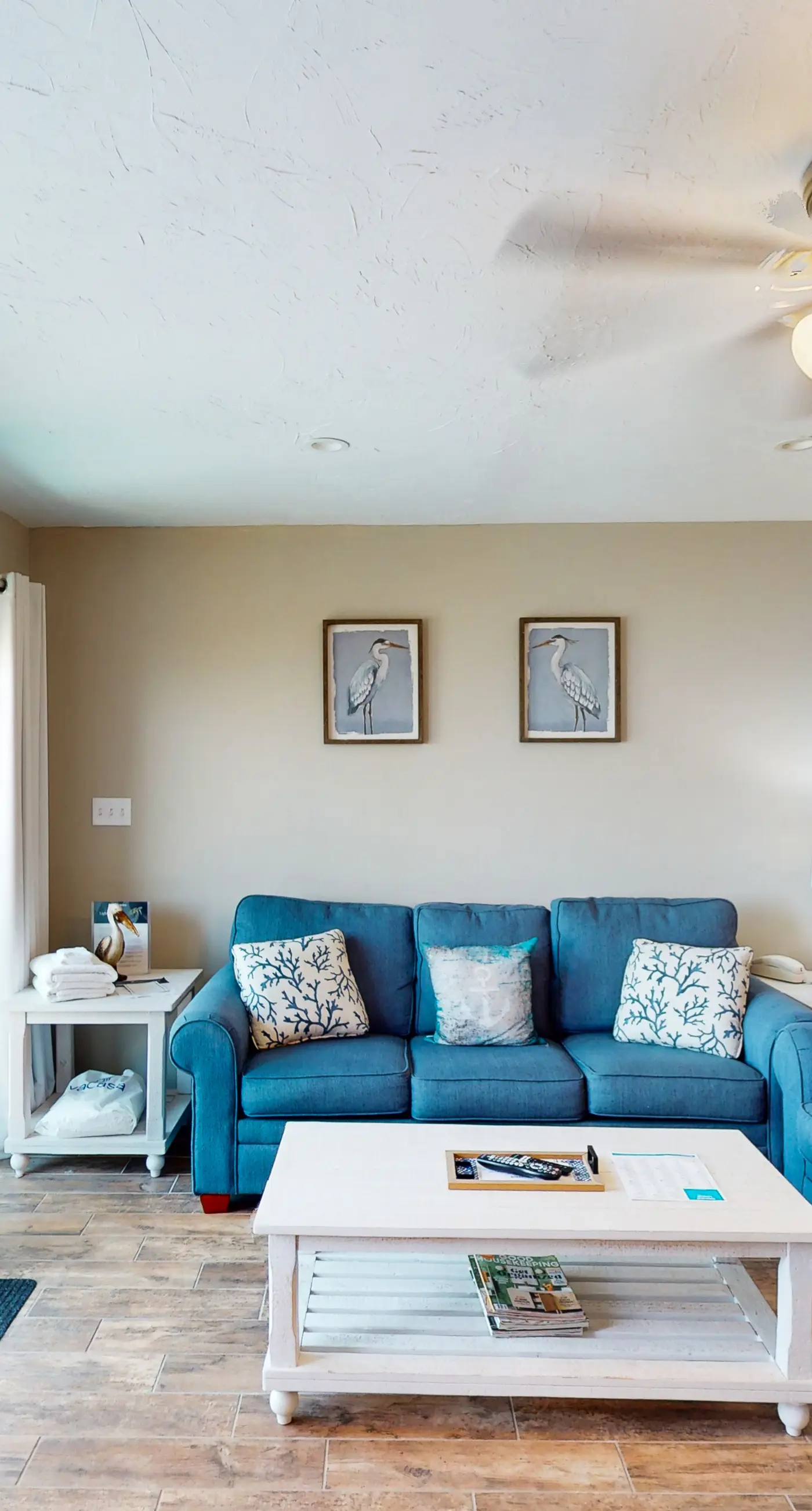 Beachfront East End townhouse with beach views, deck, on-site pool & grills