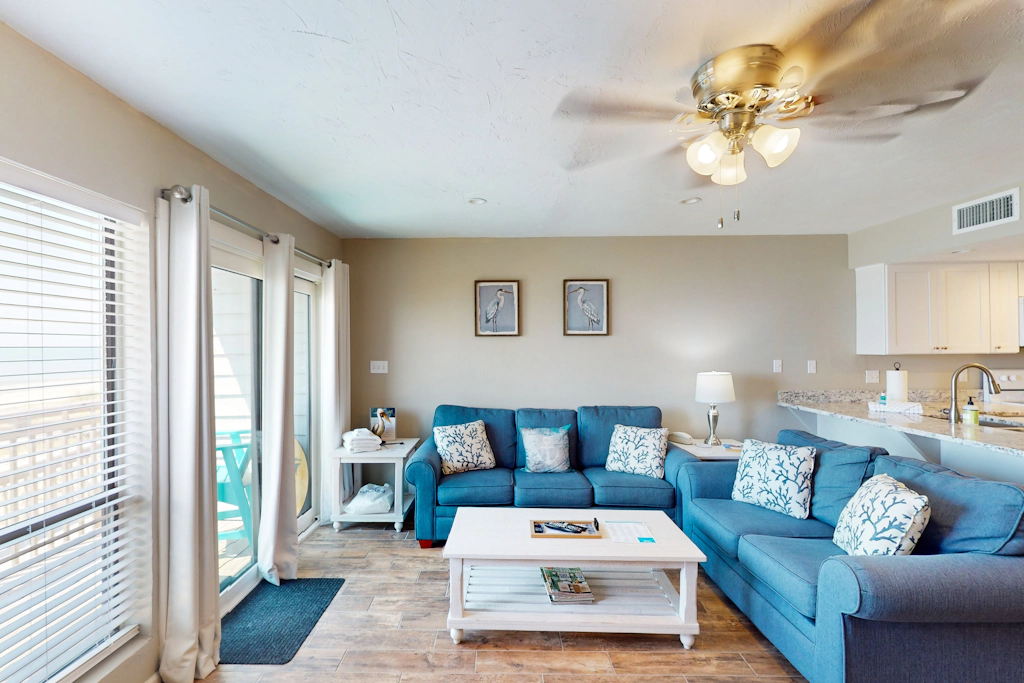 Beachfront East End townhouse with beach views, deck, on-site pool & grills