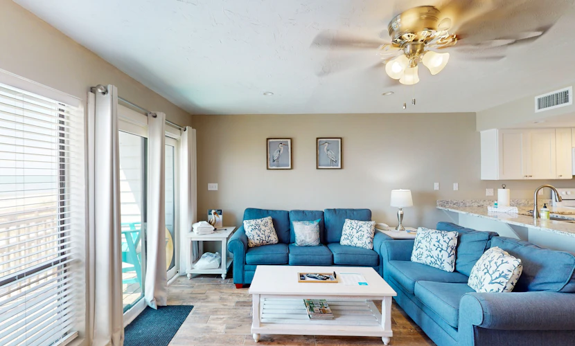 Beachfront East End townhouse with beach views, deck, on-site pool & grills