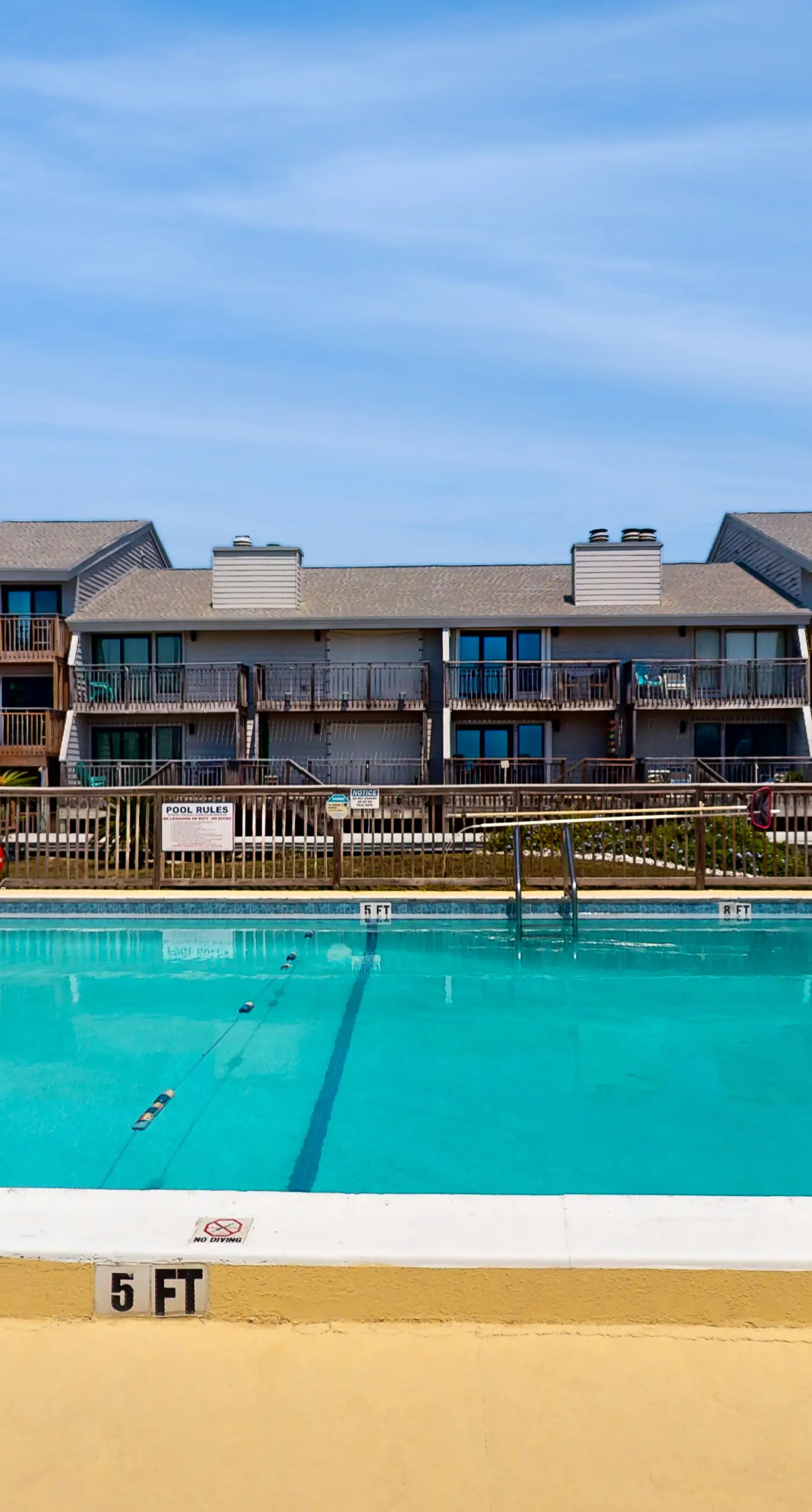 Beachfront East End townhouse with beach views, deck, on-site pool & grills