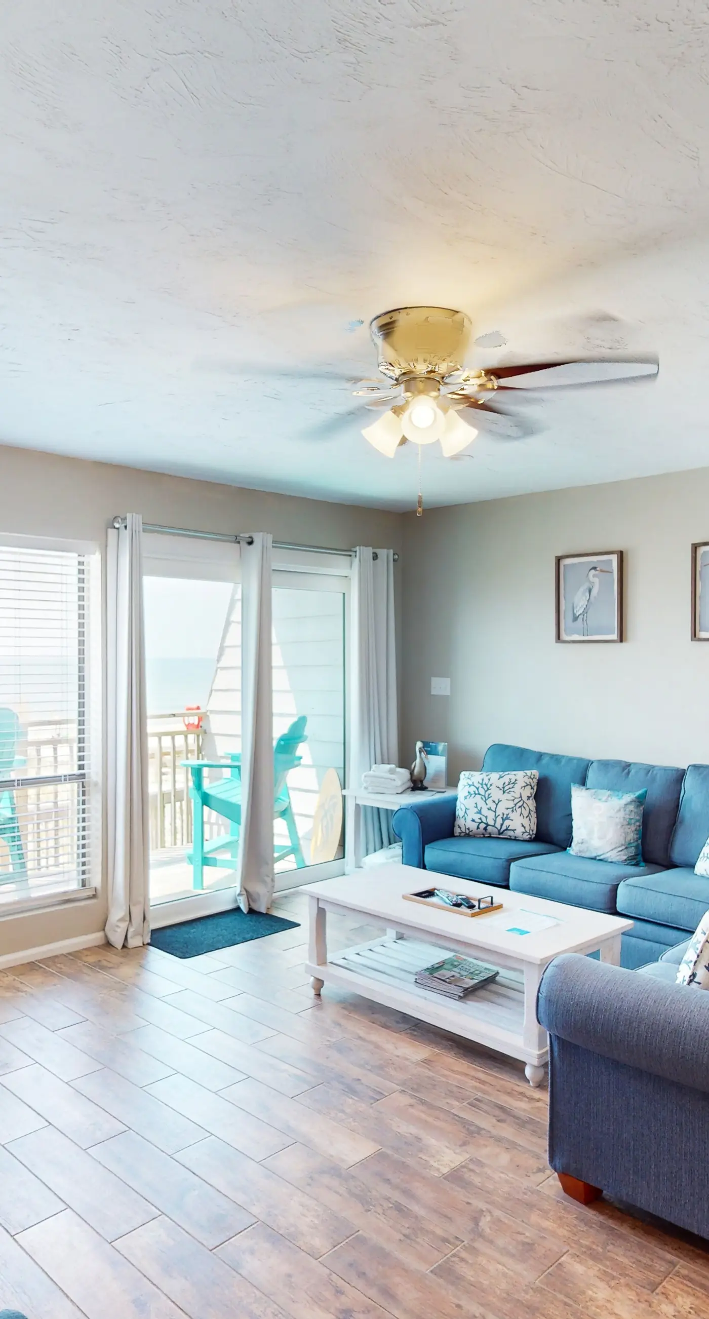 Beachfront East End townhouse with beach views, deck, on-site pool & grills