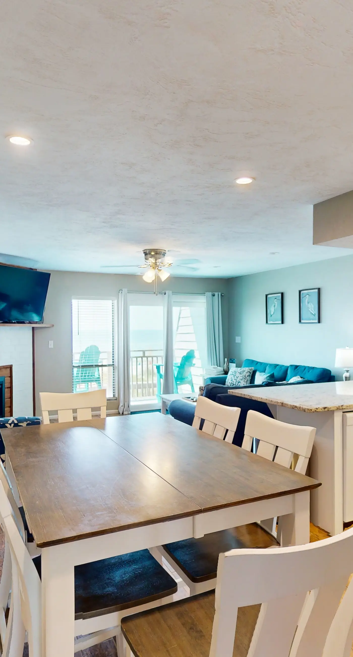 Beachfront East End townhouse with beach views, deck, on-site pool & grills