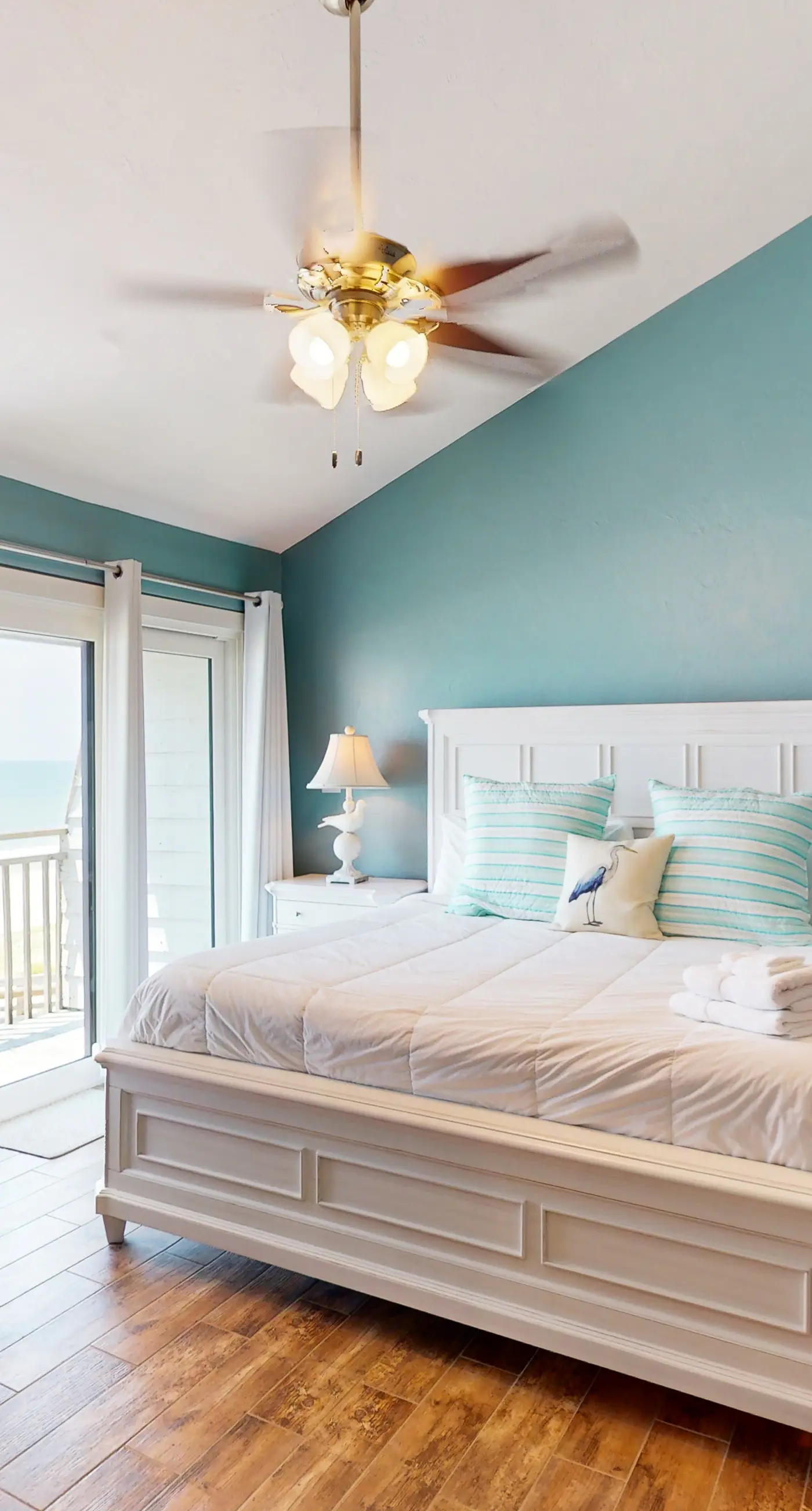 Beachfront East End townhouse with beach views, deck, on-site pool & grills