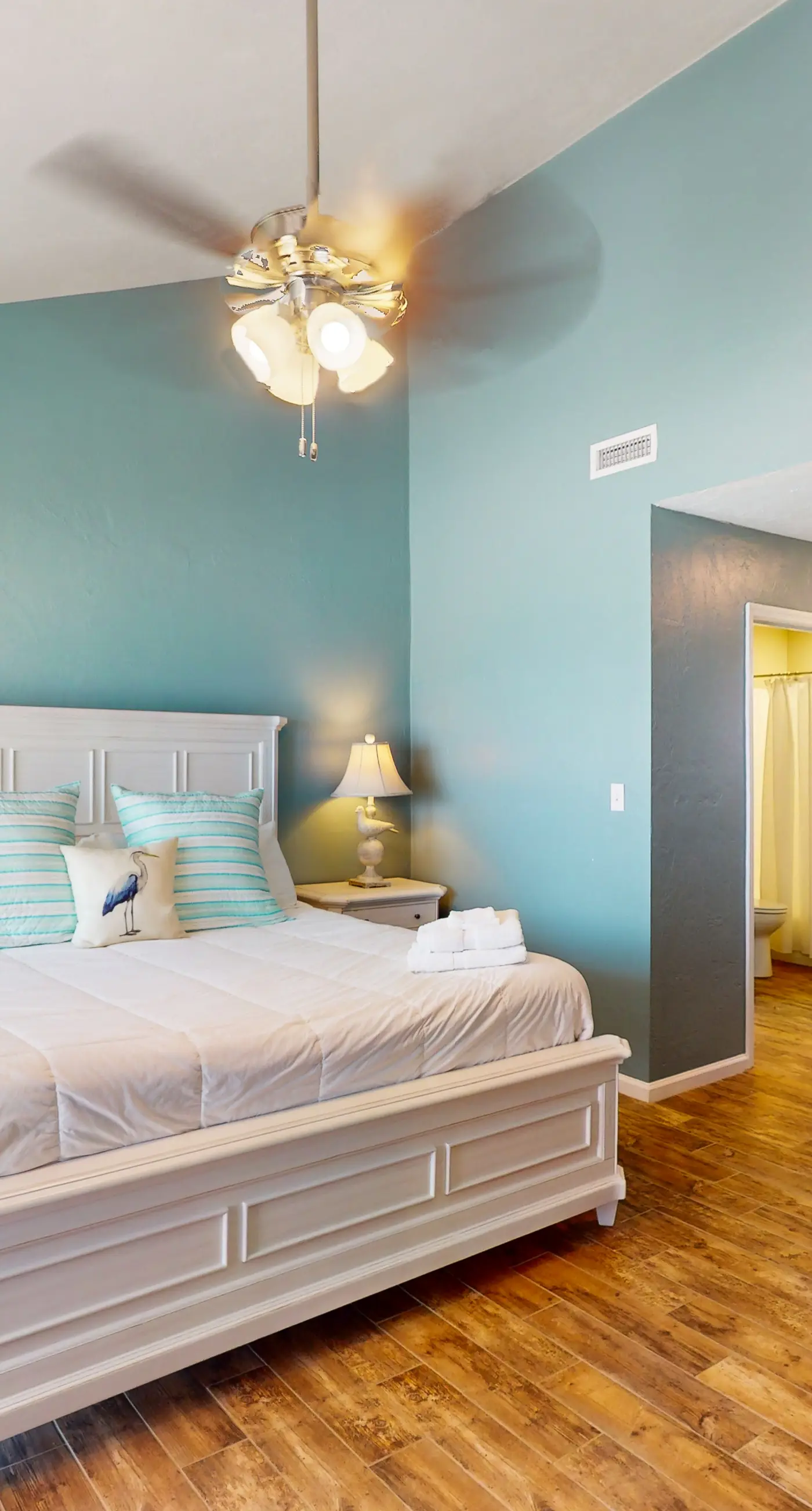 Beachfront East End townhouse with beach views, deck, on-site pool & grills