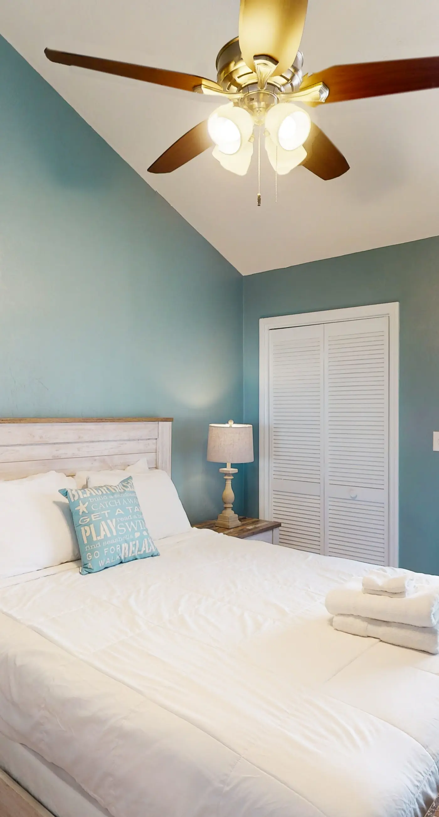 Beachfront East End townhouse with beach views, deck, on-site pool & grills