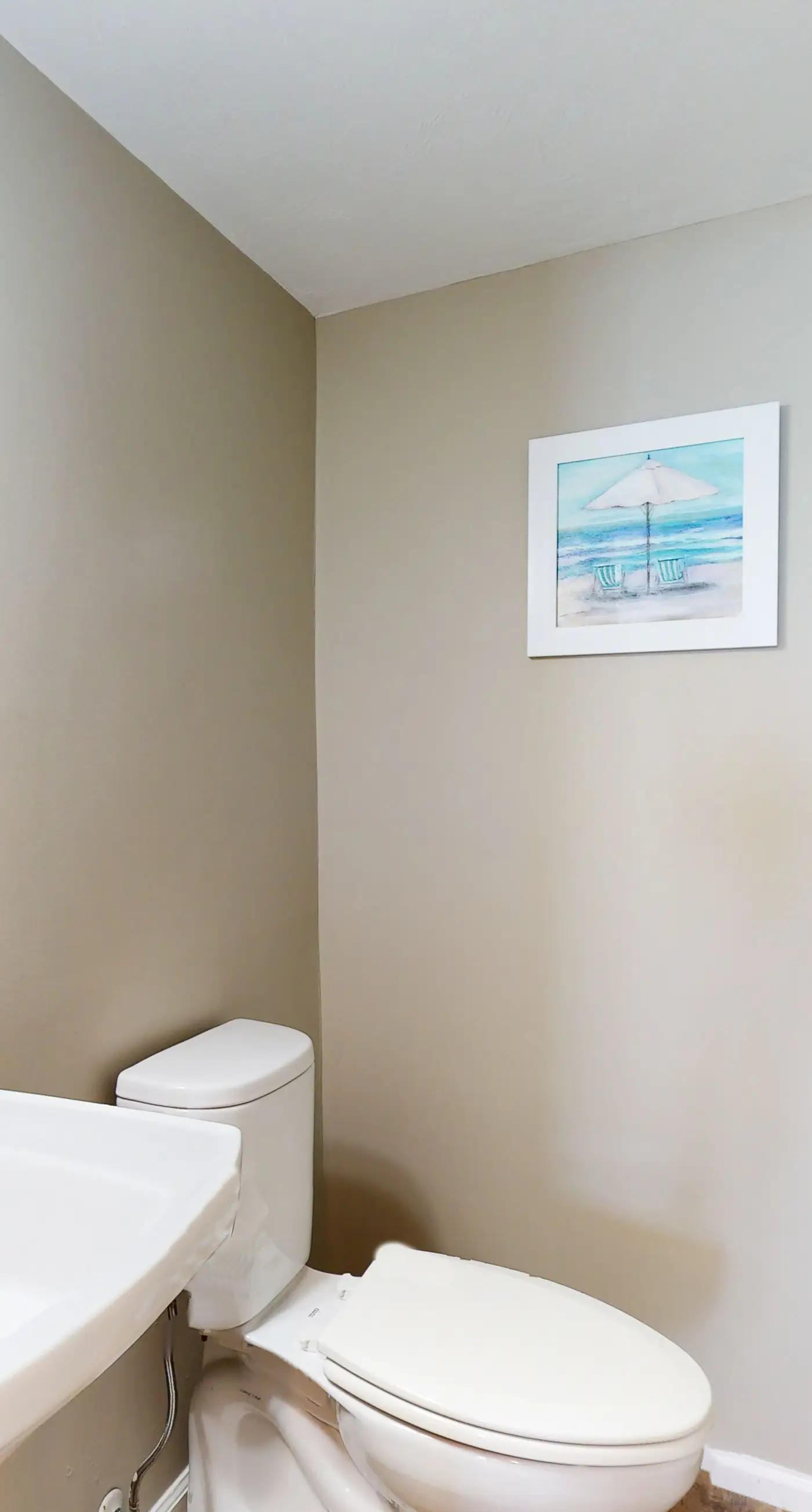 Beachfront East End townhouse with beach views, deck, on-site pool & grills