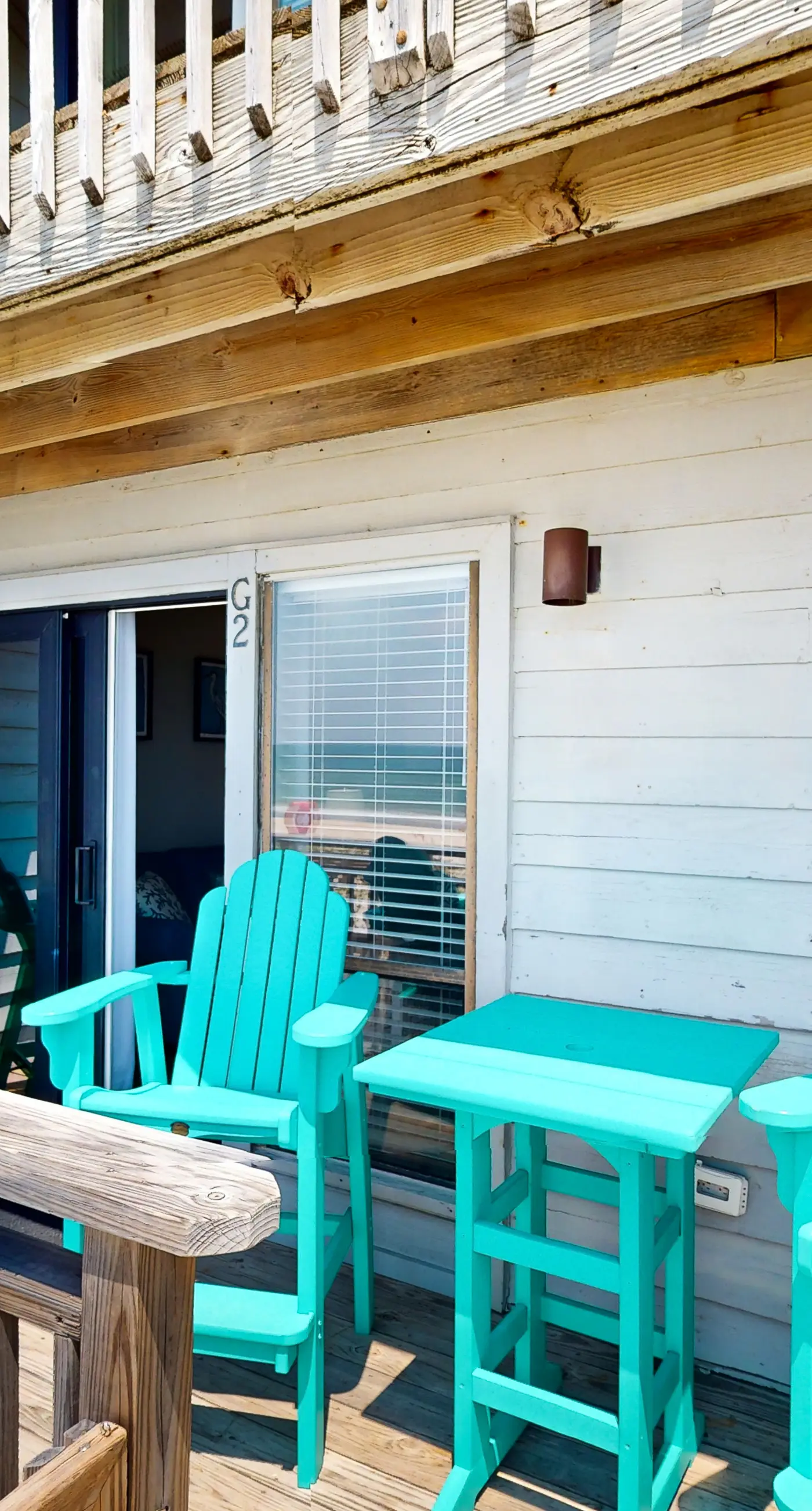 Beachfront East End townhouse with beach views, deck, on-site pool & grills