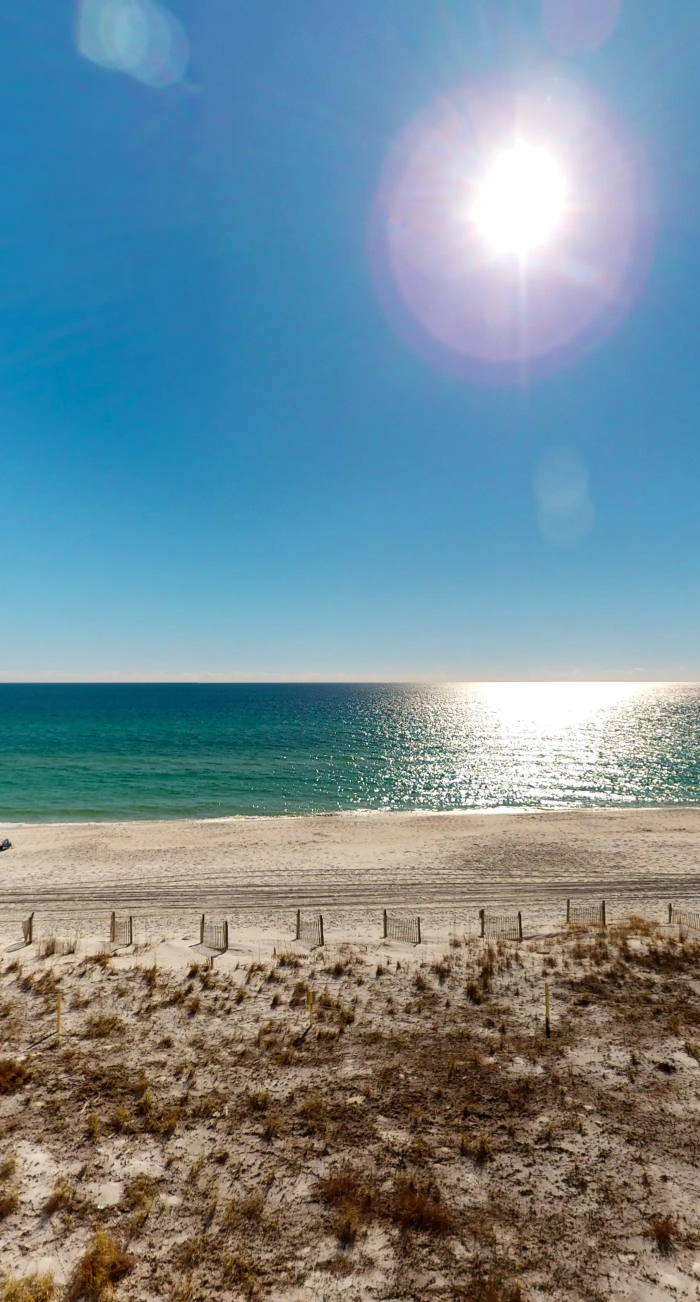 Gulf view & beachfront condo with balcony, pool, tennis, & gym