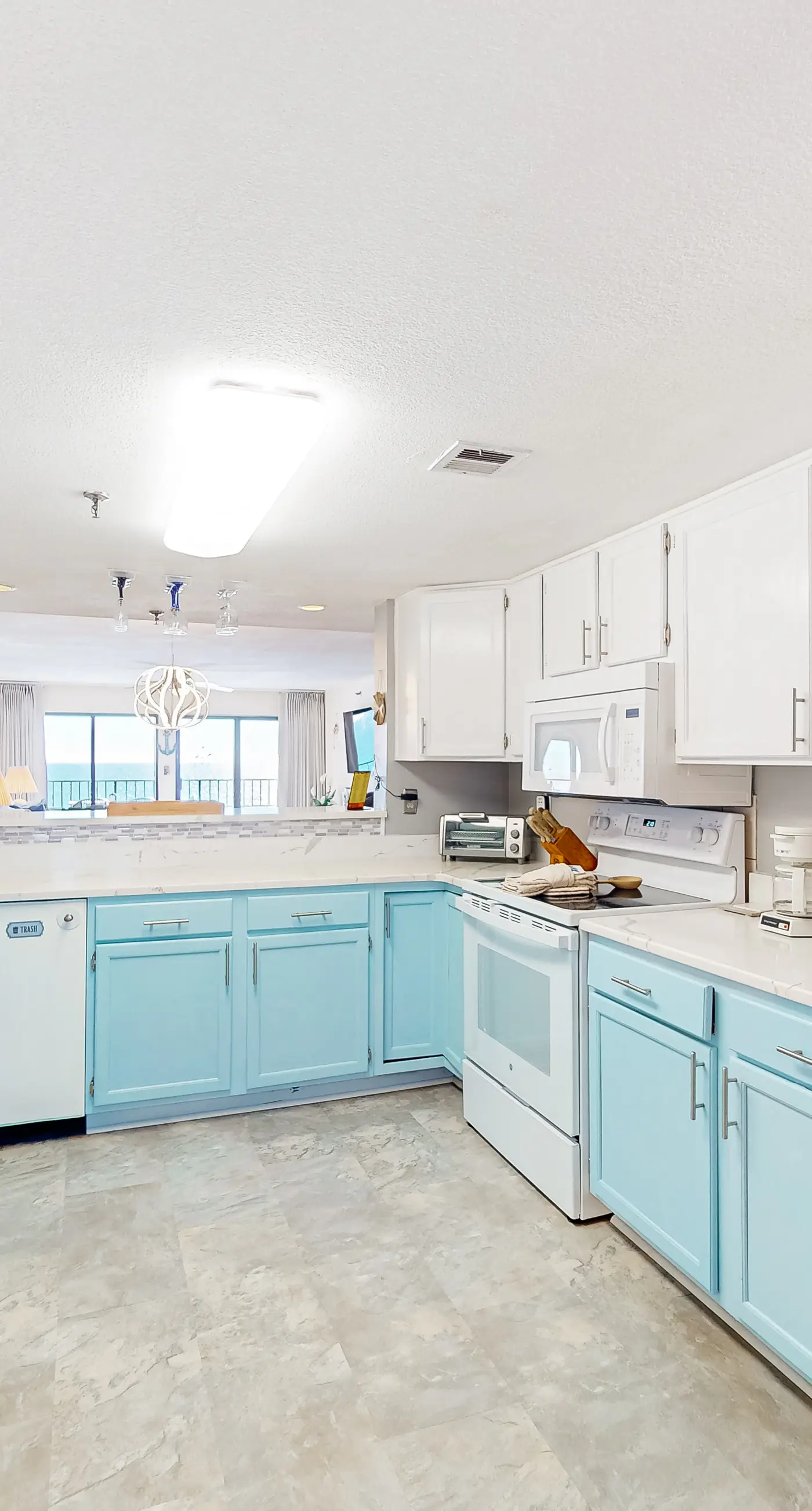 Gulf view & beachfront condo with balcony, pool, tennis, & gym