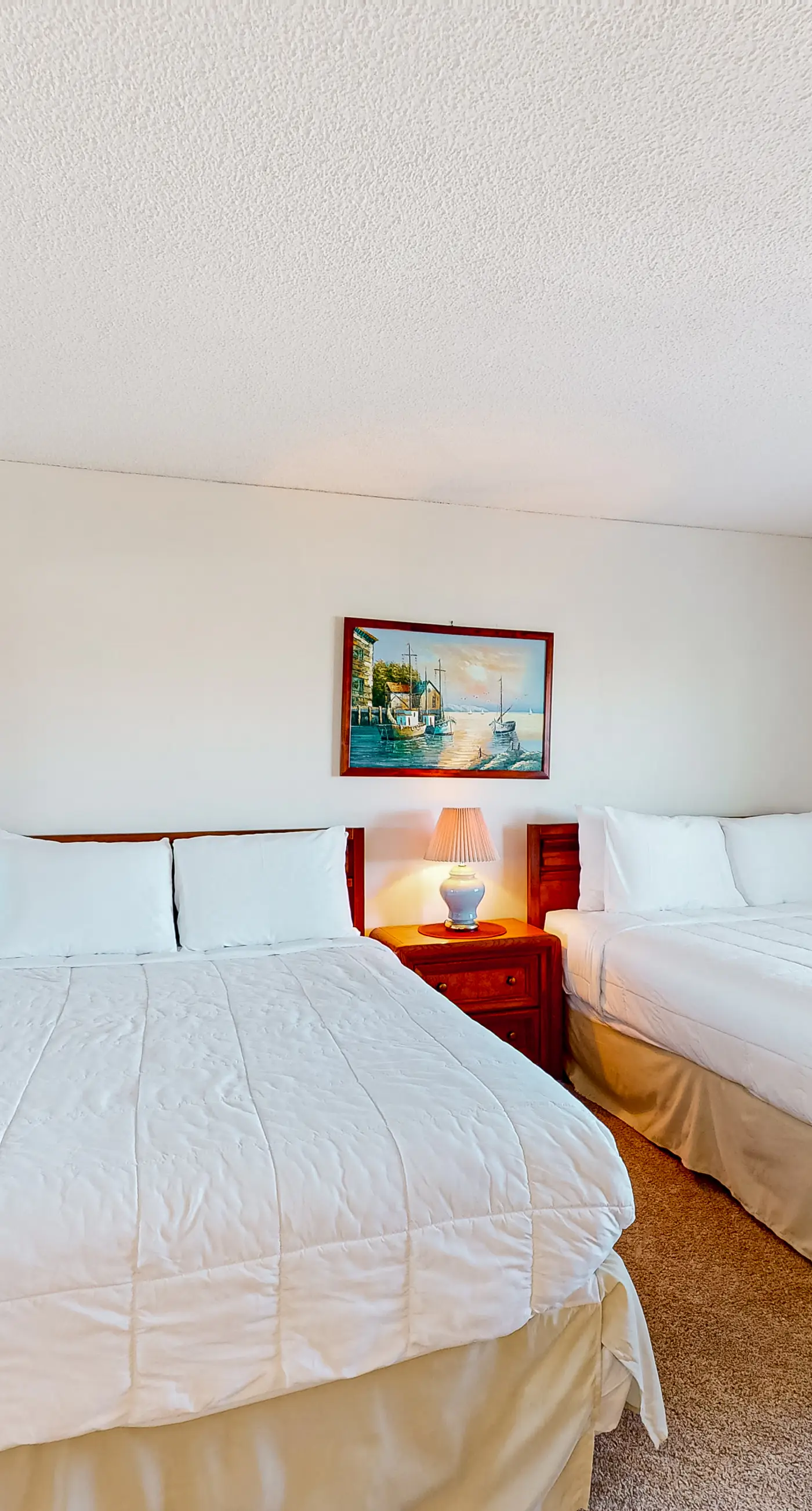 Gulf view & beachfront condo with balcony, pool, tennis, & gym