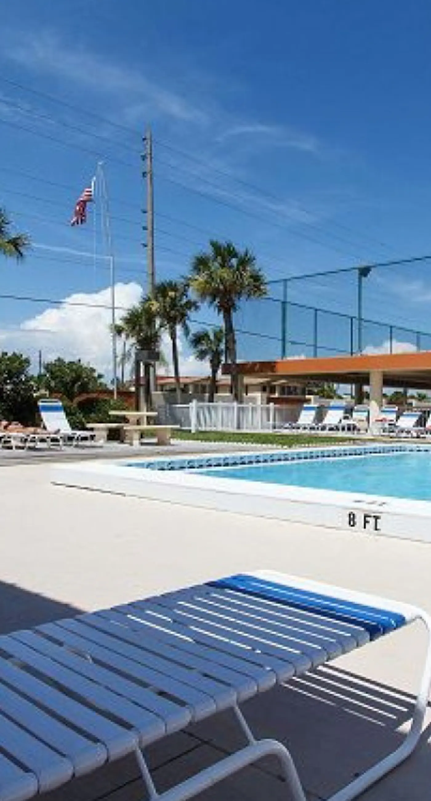 Gulf view & beachfront condo with balcony, pool, tennis, & gym