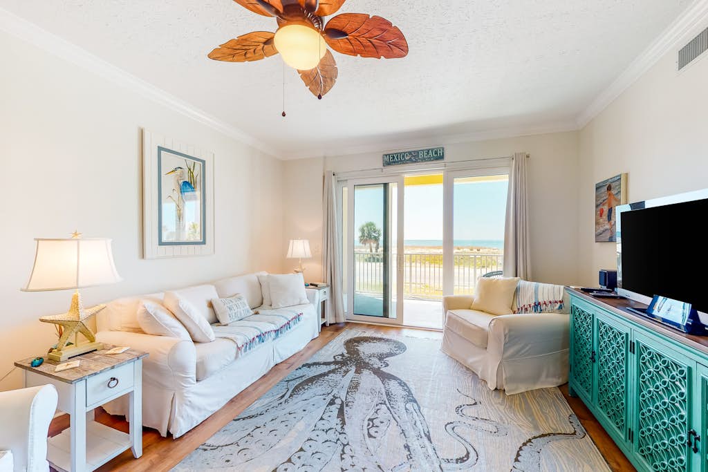 Ocean view condo with central AC, WiFi, washer/dryer, access to pool, hot tub