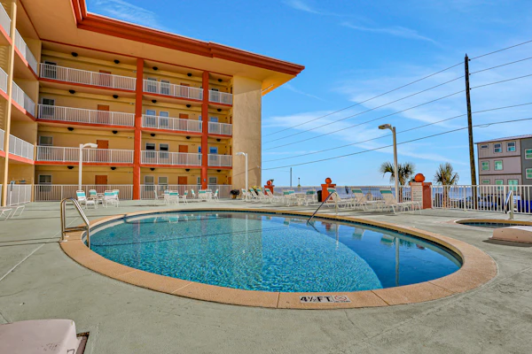 Gulf-view condo with on-site pool, hot tub, & private patio