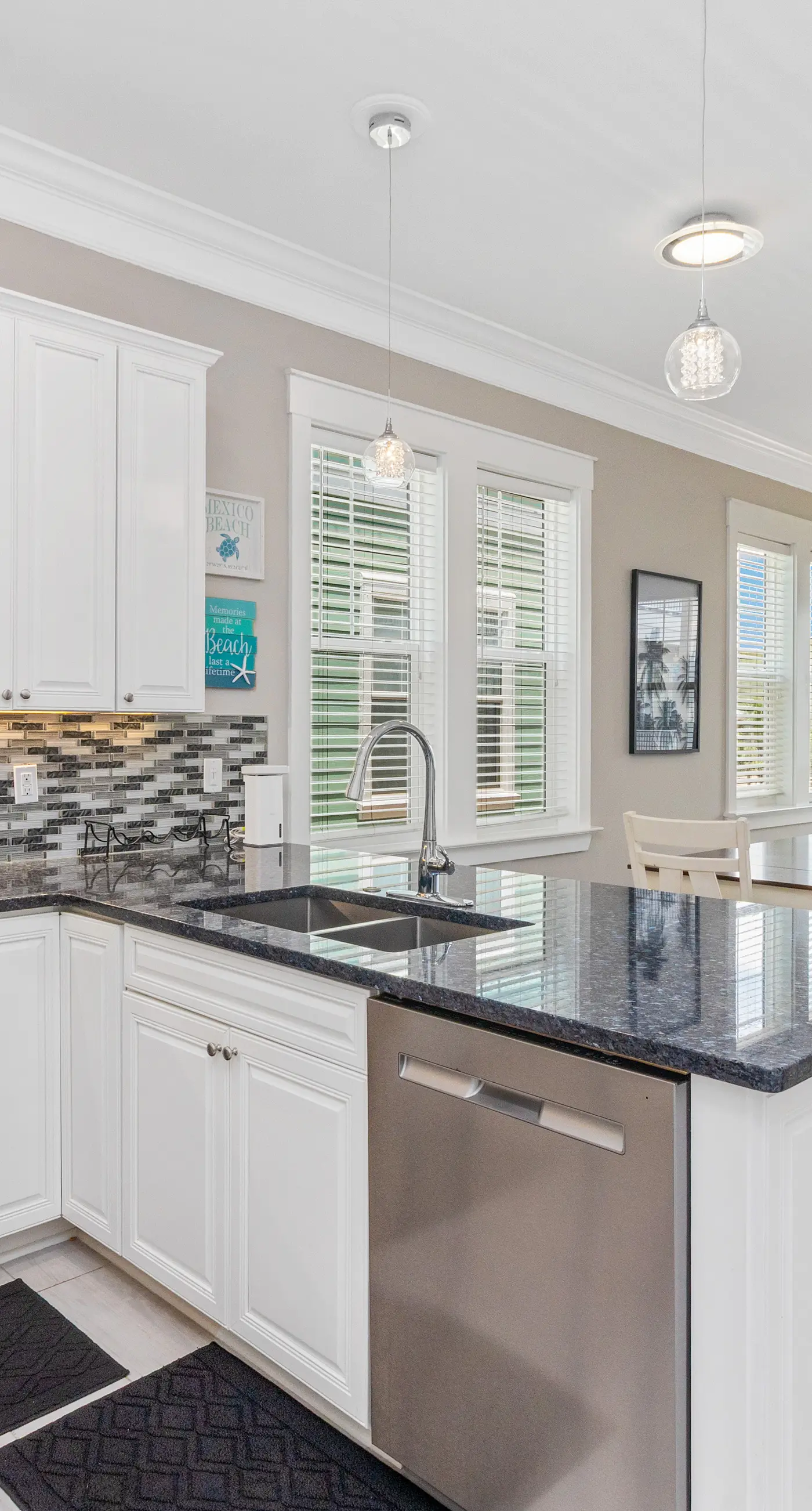 Gulf & canal views with modern amenities, pool, & beach access