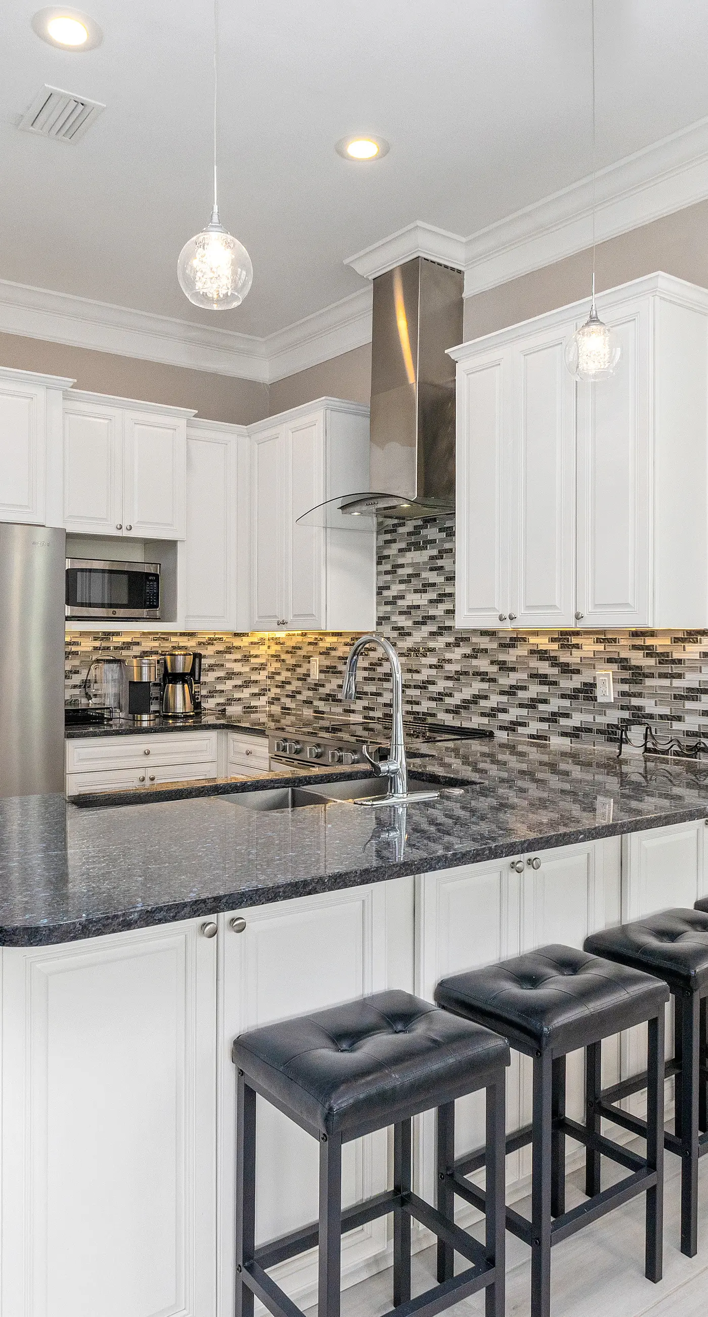 Gulf & canal views with modern amenities, pool, & beach access