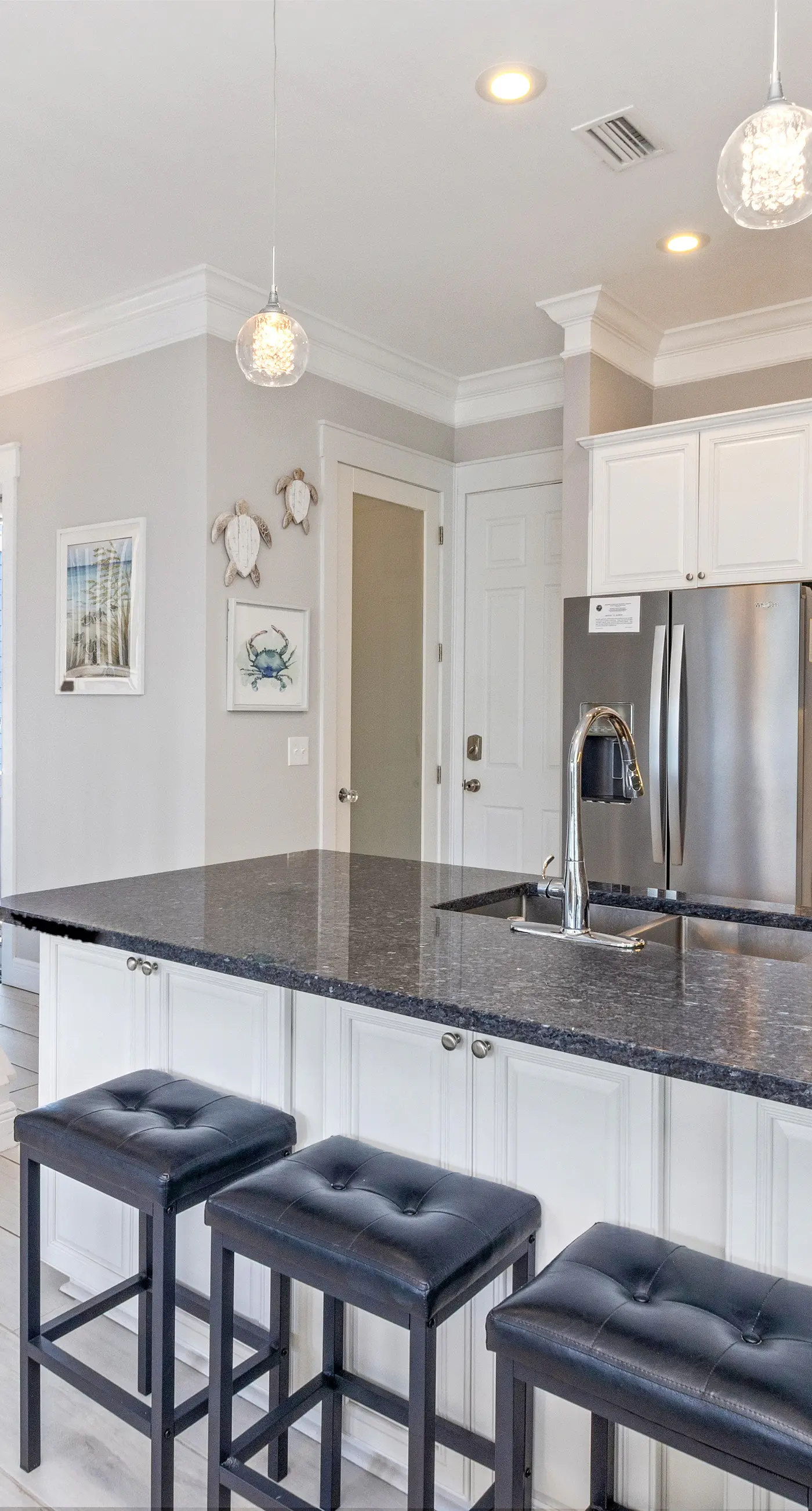 Gulf & canal views with modern amenities, pool, & beach access