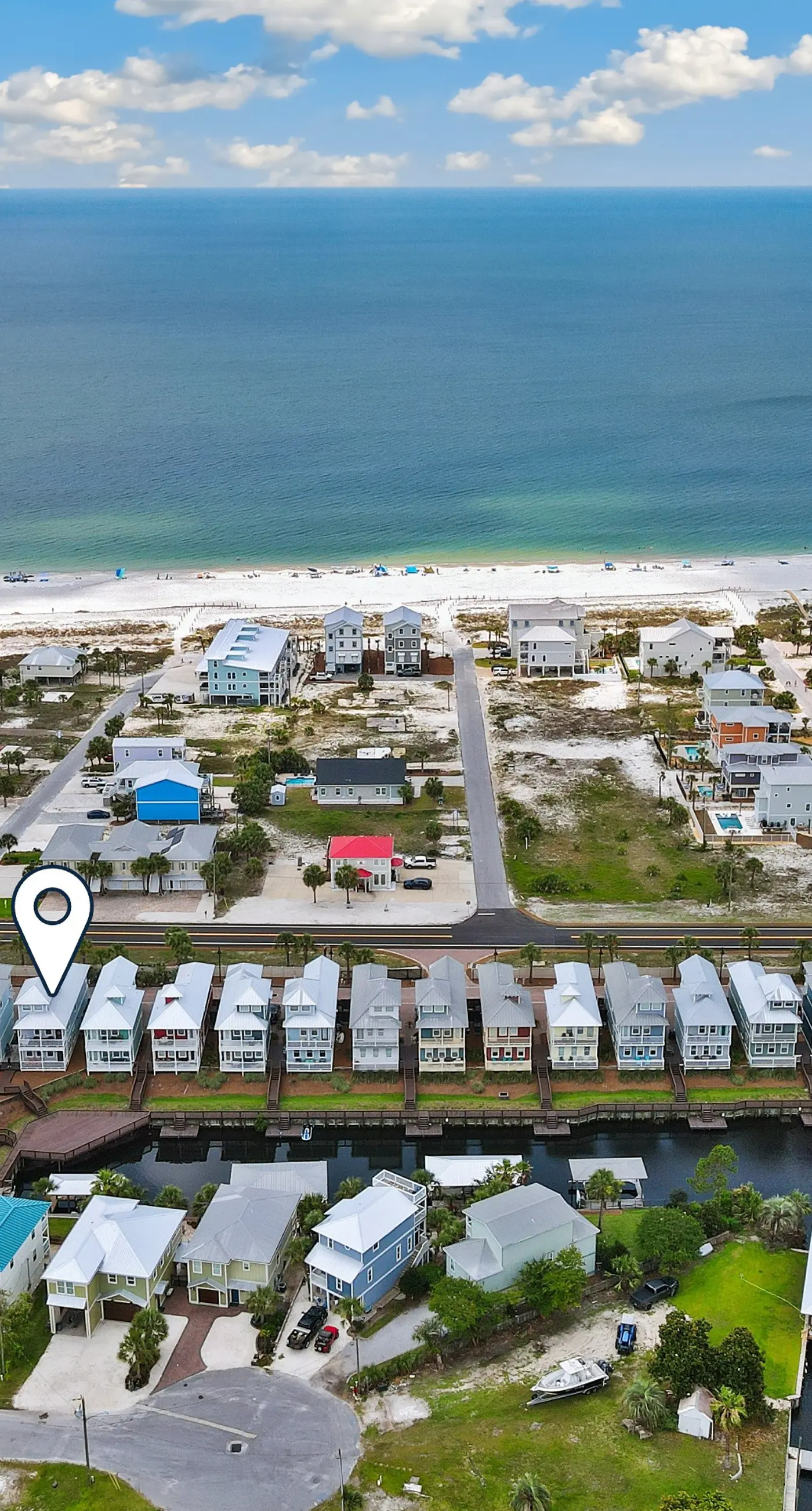 Gulf & canal views with modern amenities, pool, & beach access