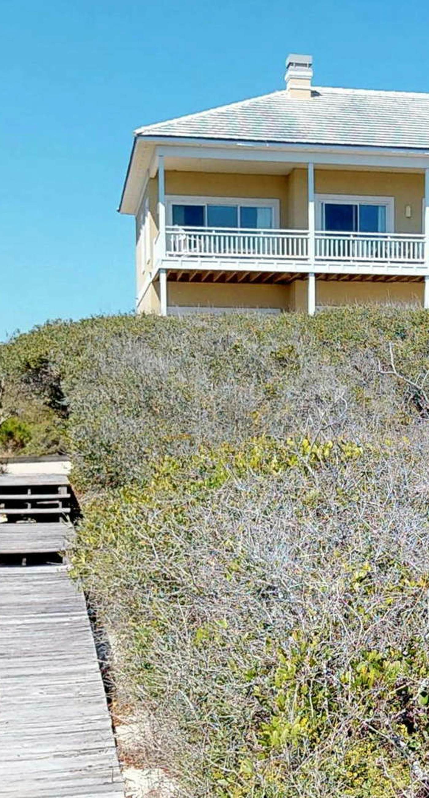 Beachfront home with elevator, beach gear, on-site neiborhood pool, tennis & fitness room