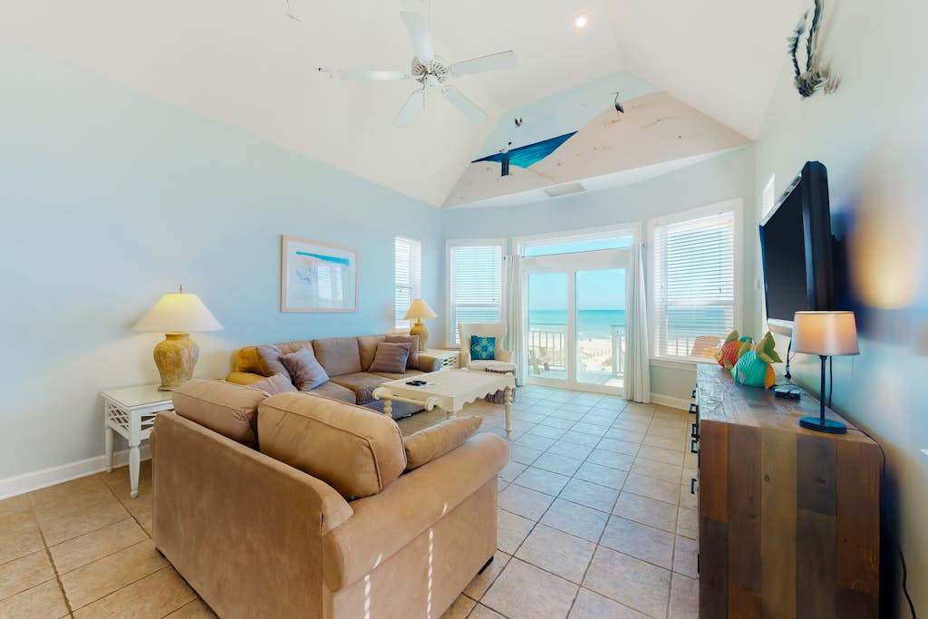Dog-friendly beachfront home with private boardwalk, park style grill, deck, beach view