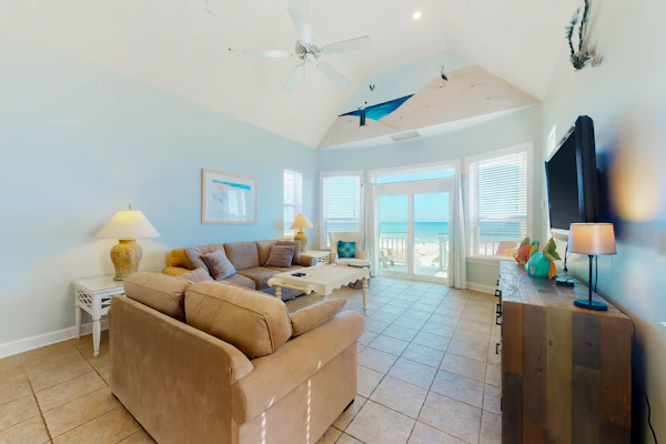 Dog-friendly beachfront home with private boardwalk, park style grill, deck, beach view