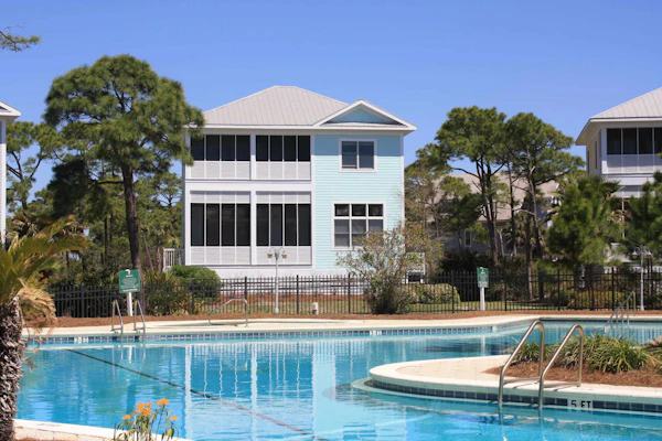 Spacious dog-friendly home with elevator, screened decks, on-site pool, & gym