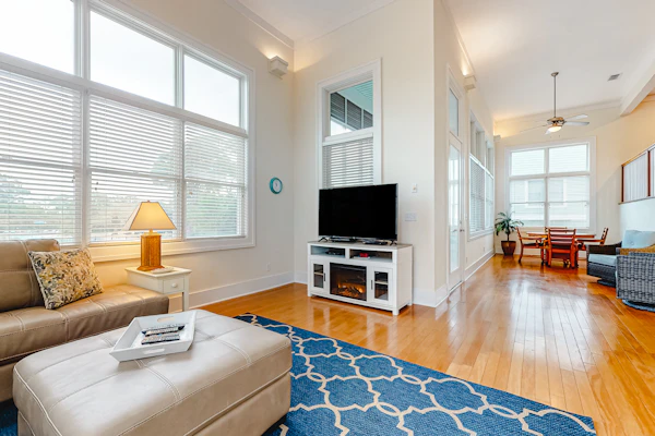 Spacious dog-friendly home with elevator, screened decks, on-site pool, & gym