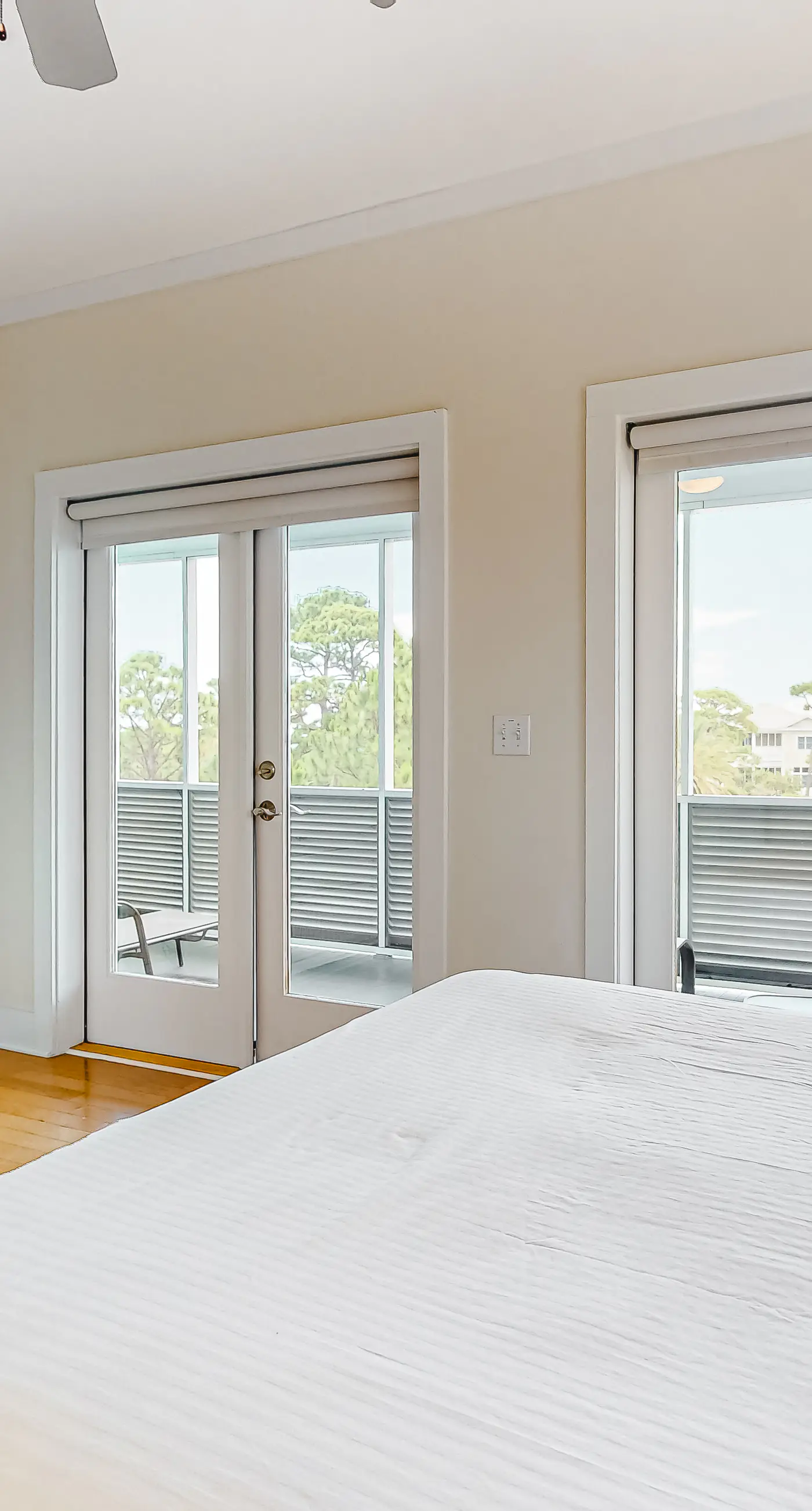 Spacious dog-friendly home with elevator, screened decks, on-site pool, & gym