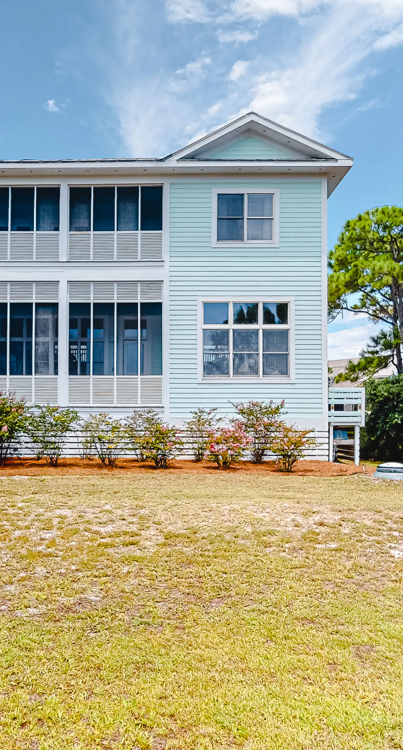 Spacious dog-friendly home with elevator, screened decks, on-site pool, & gym