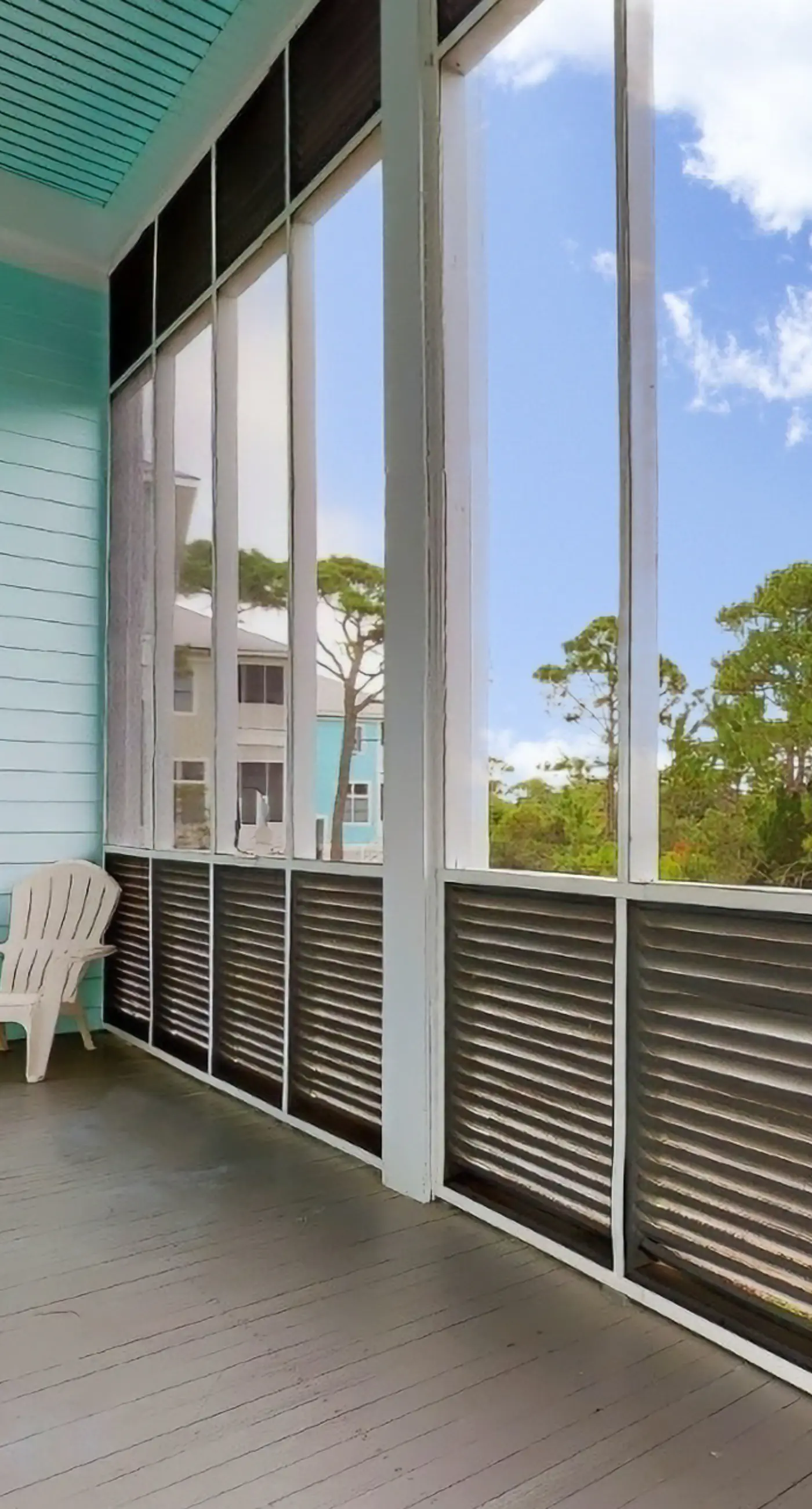 Spacious dog-friendly home with elevator, screened decks, on-site pool, & gym