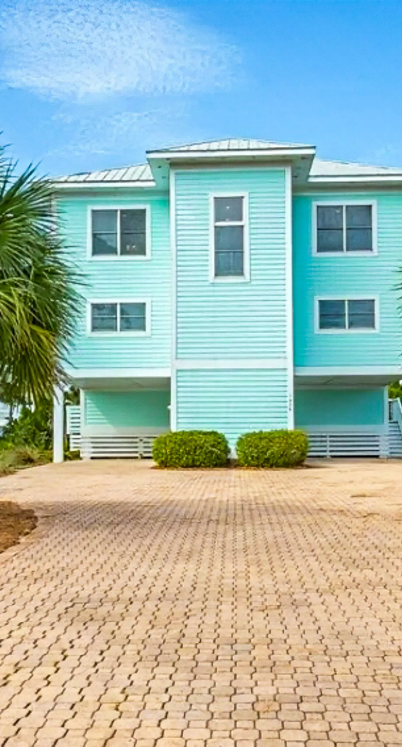 Spacious dog-friendly home with elevator, screened decks, on-site pool, & gym