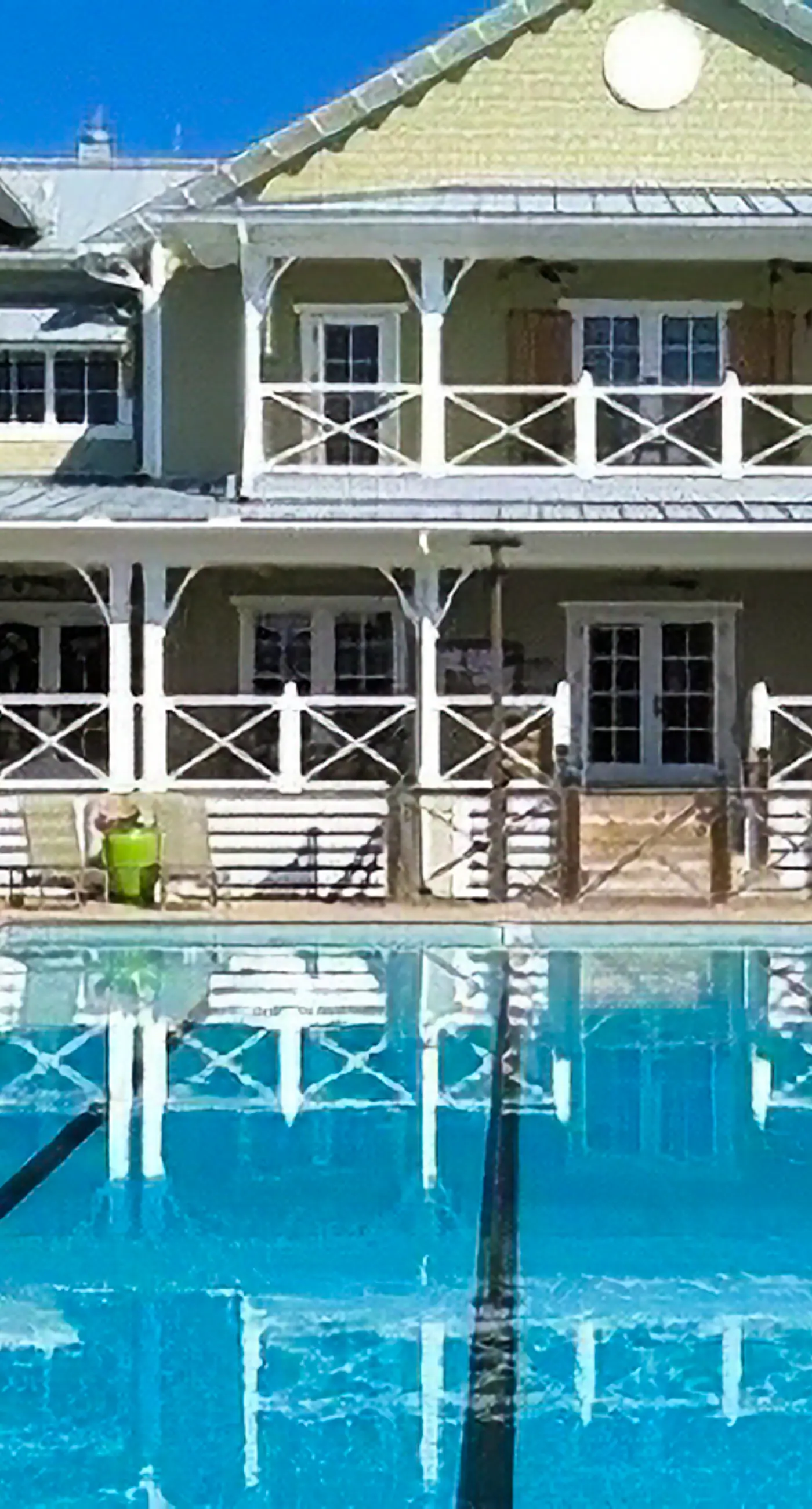 Spacious dog-friendly home with elevator, screened decks, on-site pool, & gym