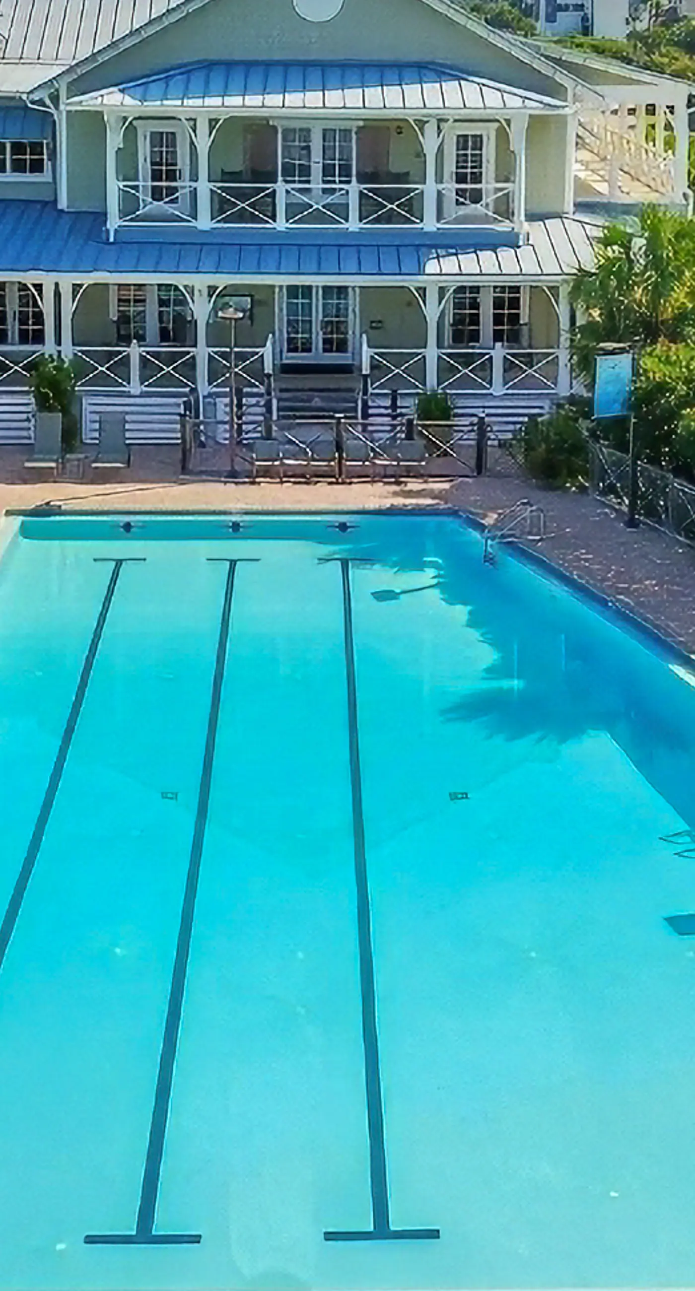 Spacious dog-friendly home with elevator, screened decks, on-site pool, & gym