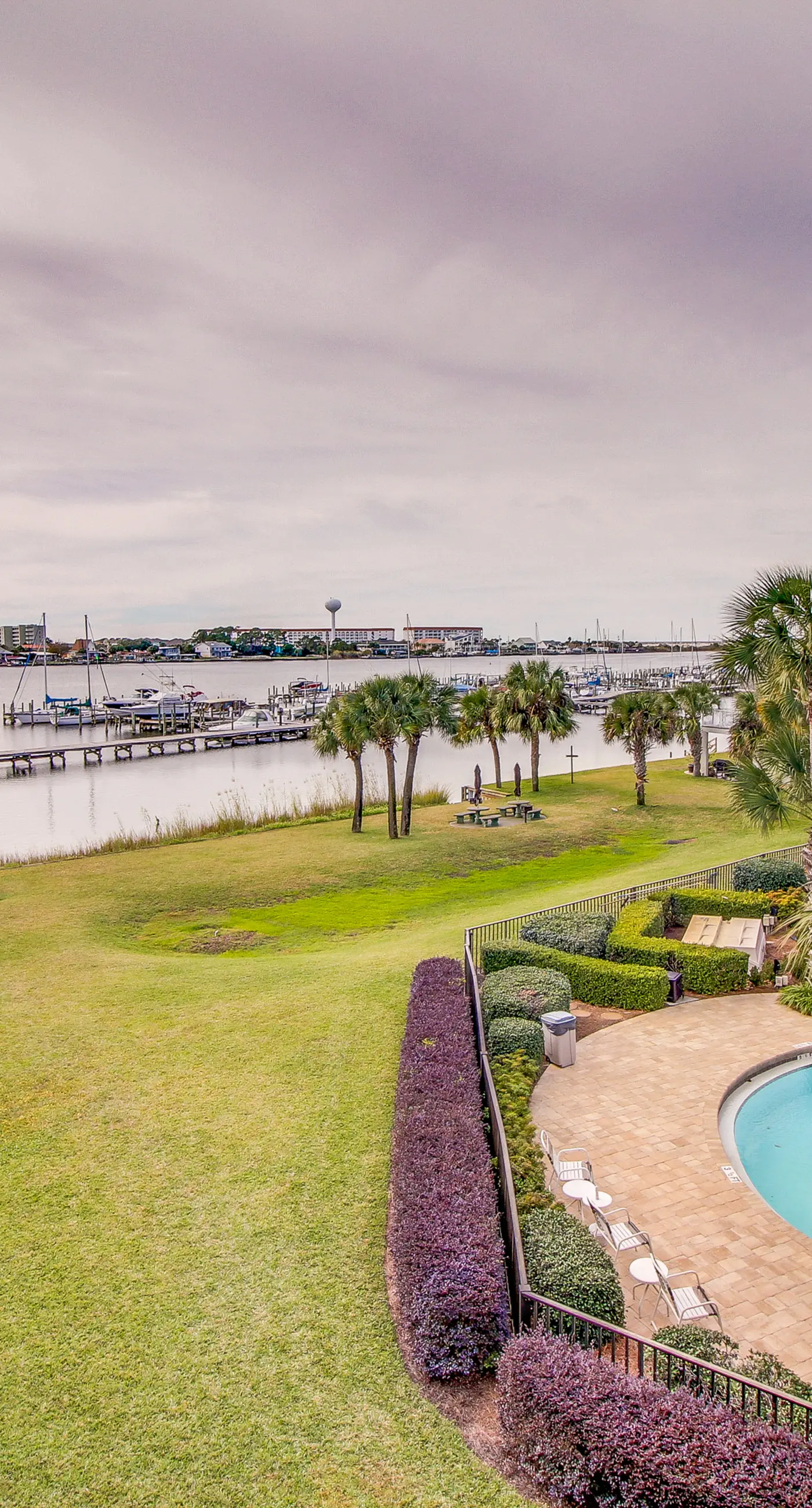 Cozy, waterfront studio condo with pool, dock & beach access