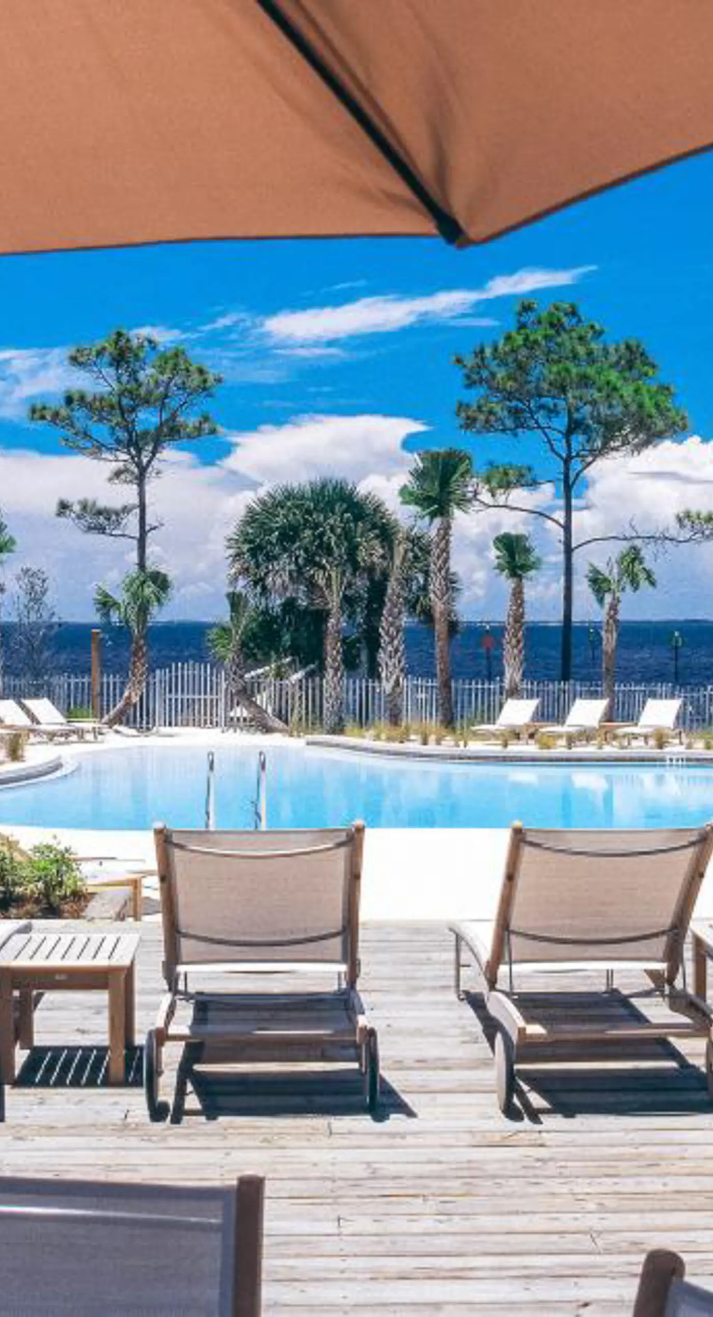 Elegant Coastal Home w/Shared Pool, Tree-Lined View, 6-Minute Walk to the Beach