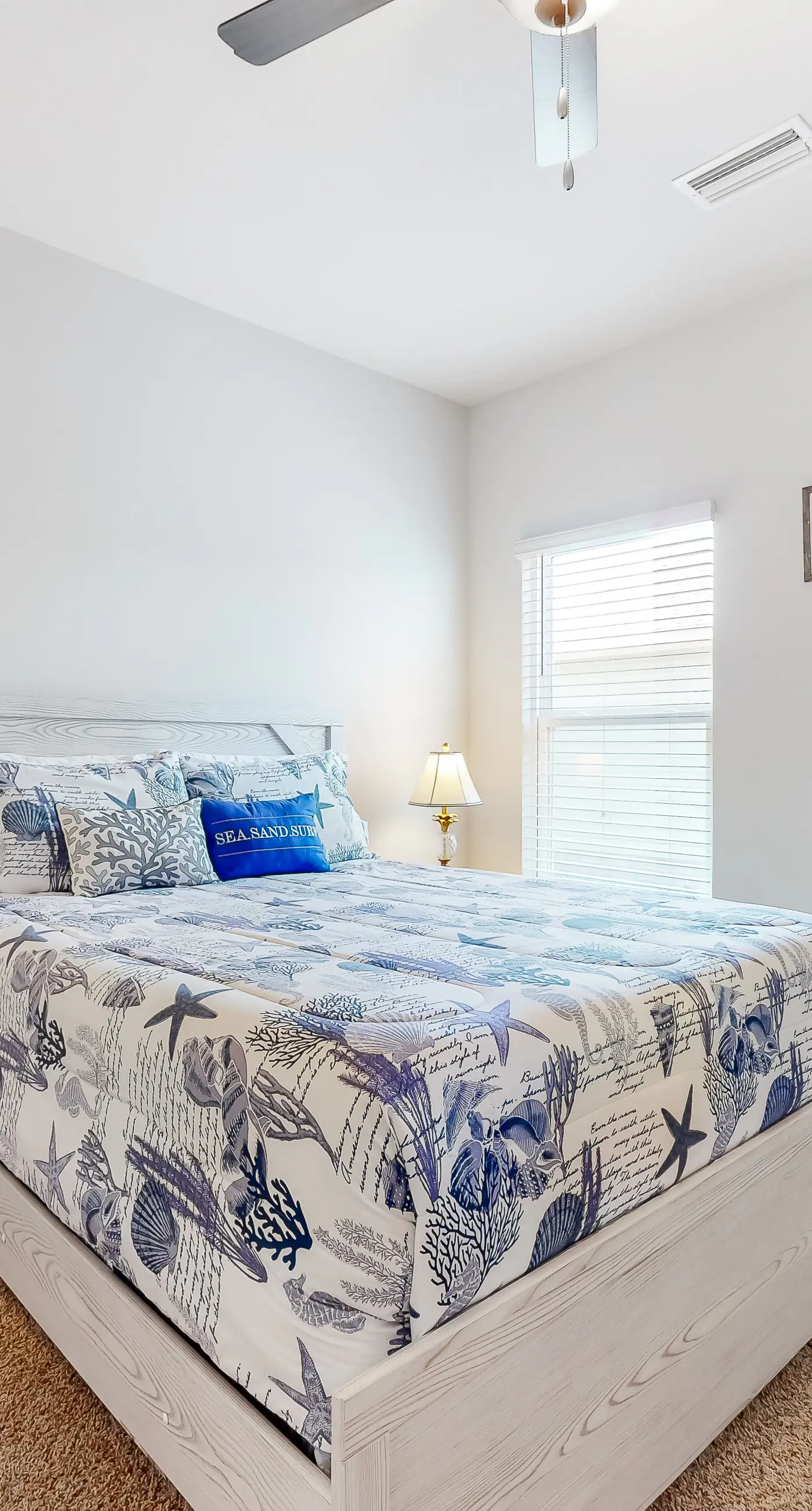 Lovely coastal home with pool access, fast WiFi, screened patio & great location