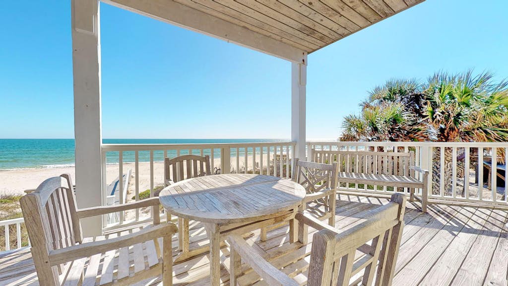 Upscale beachfront home with private hot tub, grill, on-site pools, gym, dogs OK