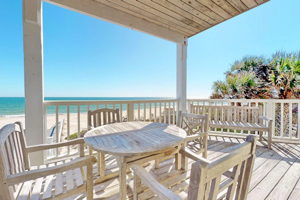 Upscale beachfront home with private hot tub, grill, on-site pools, gym, dogs OK