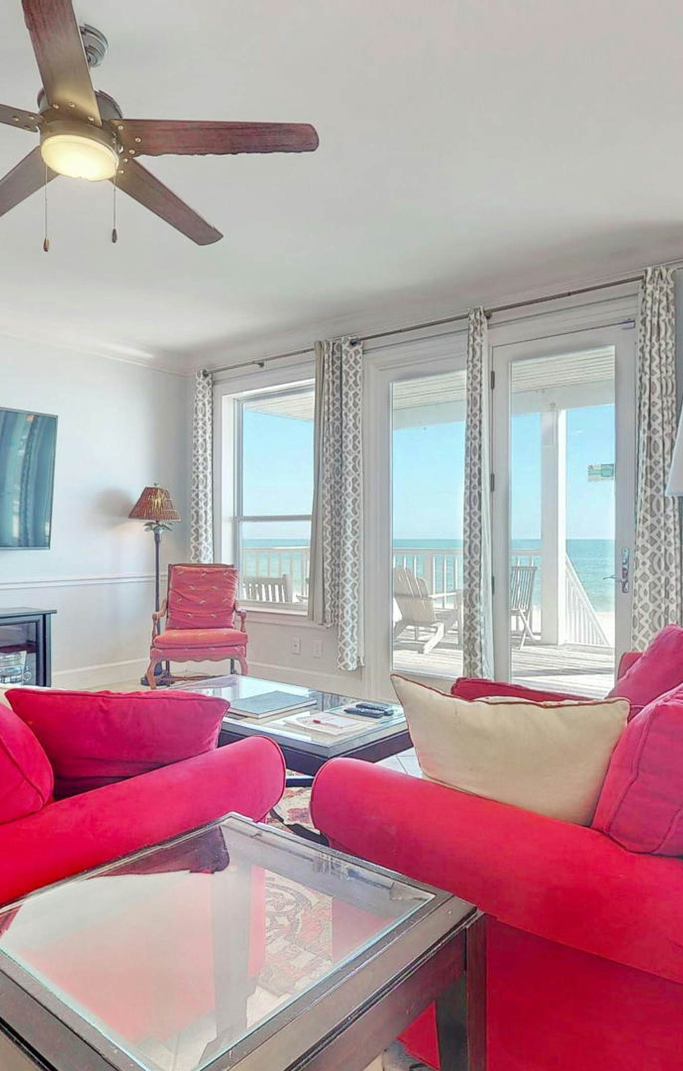 Upscale beachfront home with private hot tub, grill, on-site pools, gym, dogs OK