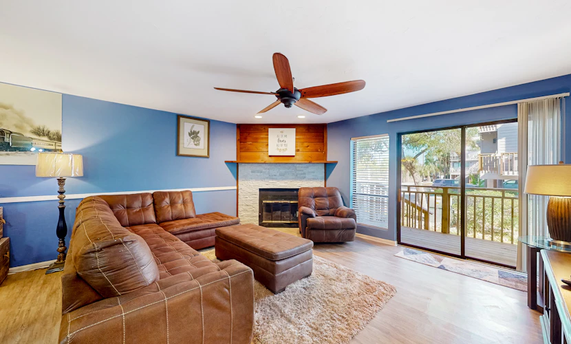 Inviting townhouse with on-site pool, updated interior, & W/D