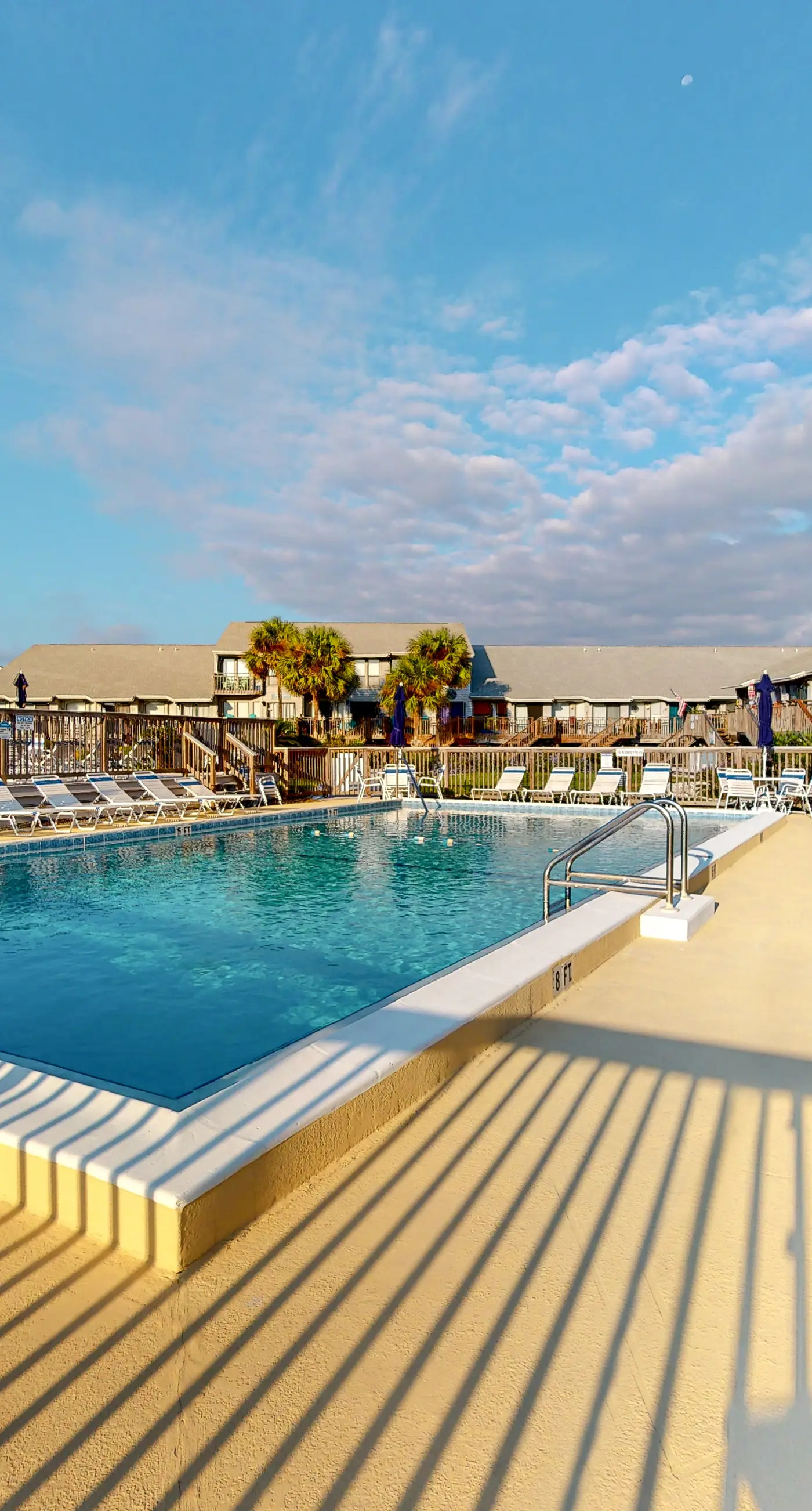 Inviting townhouse with on-site pool, updated interior, & W/D