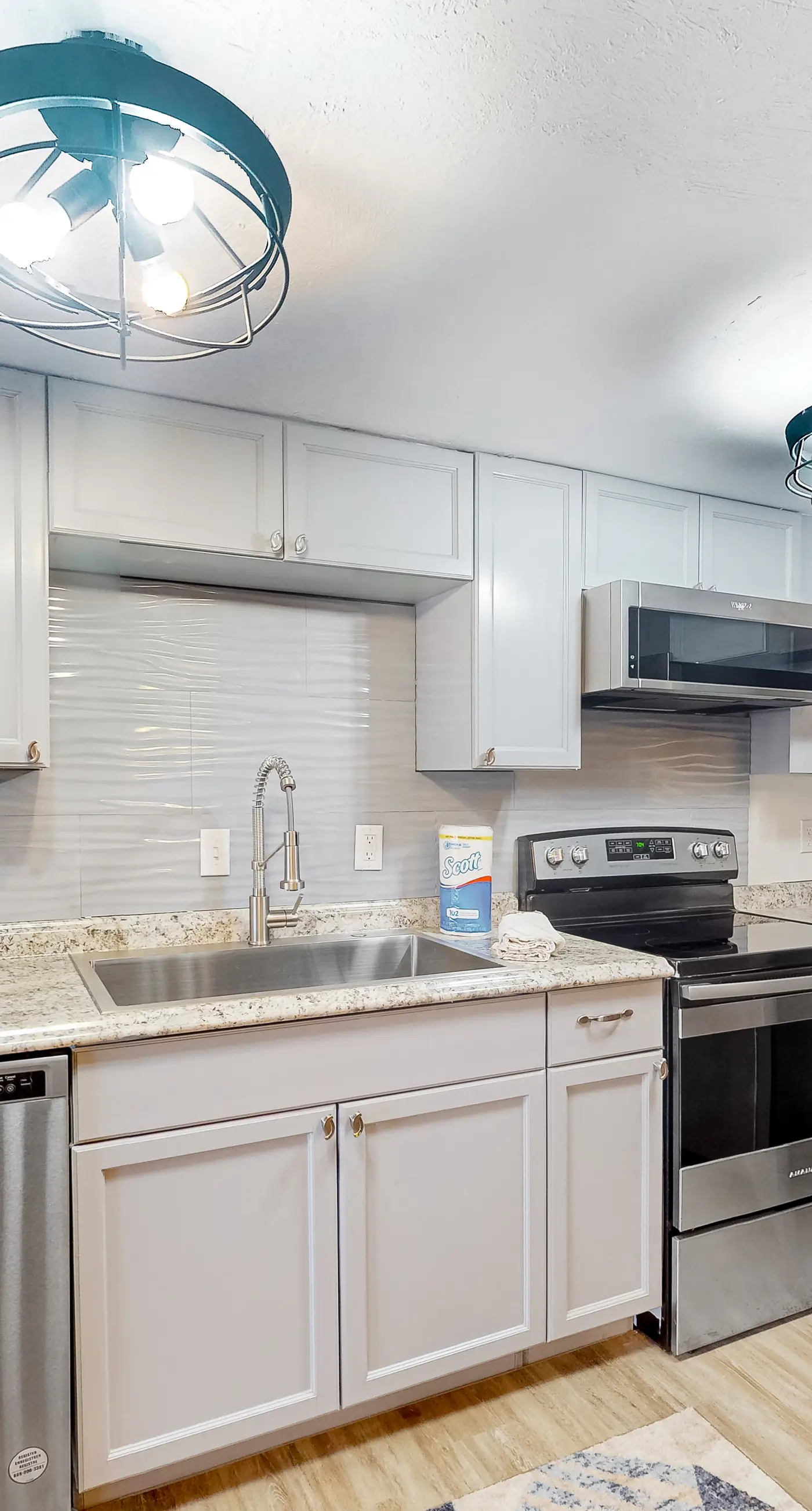 Inviting townhouse with on-site pool, updated interior, & W/D