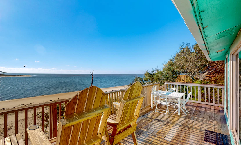 Beachfront dune cottage with deck & view of St Vincent Island