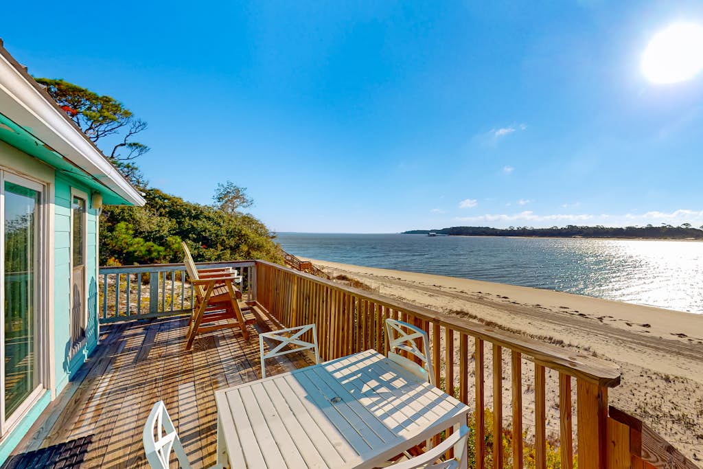 Beachfront dune cottage with deck & view of St Vincent Island