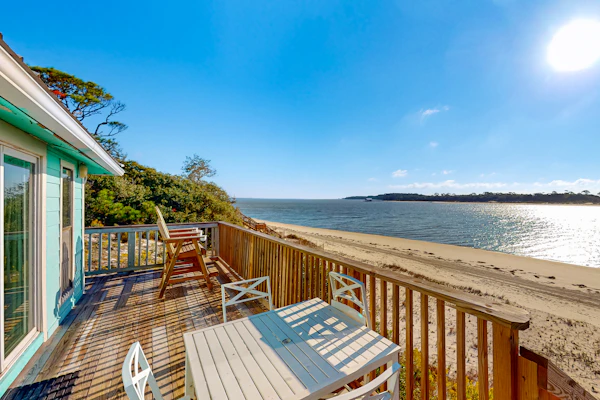 Beachfront dune cottage with deck & view of St Vincent Island