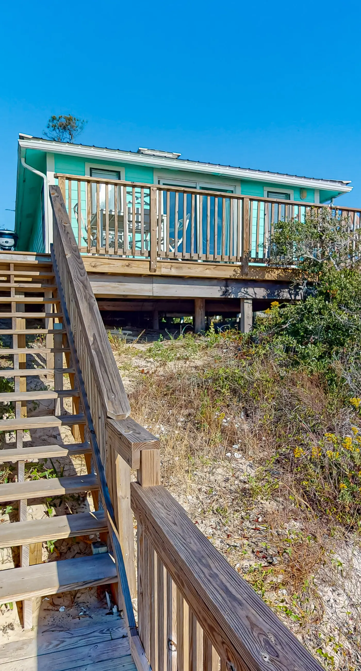 Beachfront dune cottage with deck & view of St Vincent Island