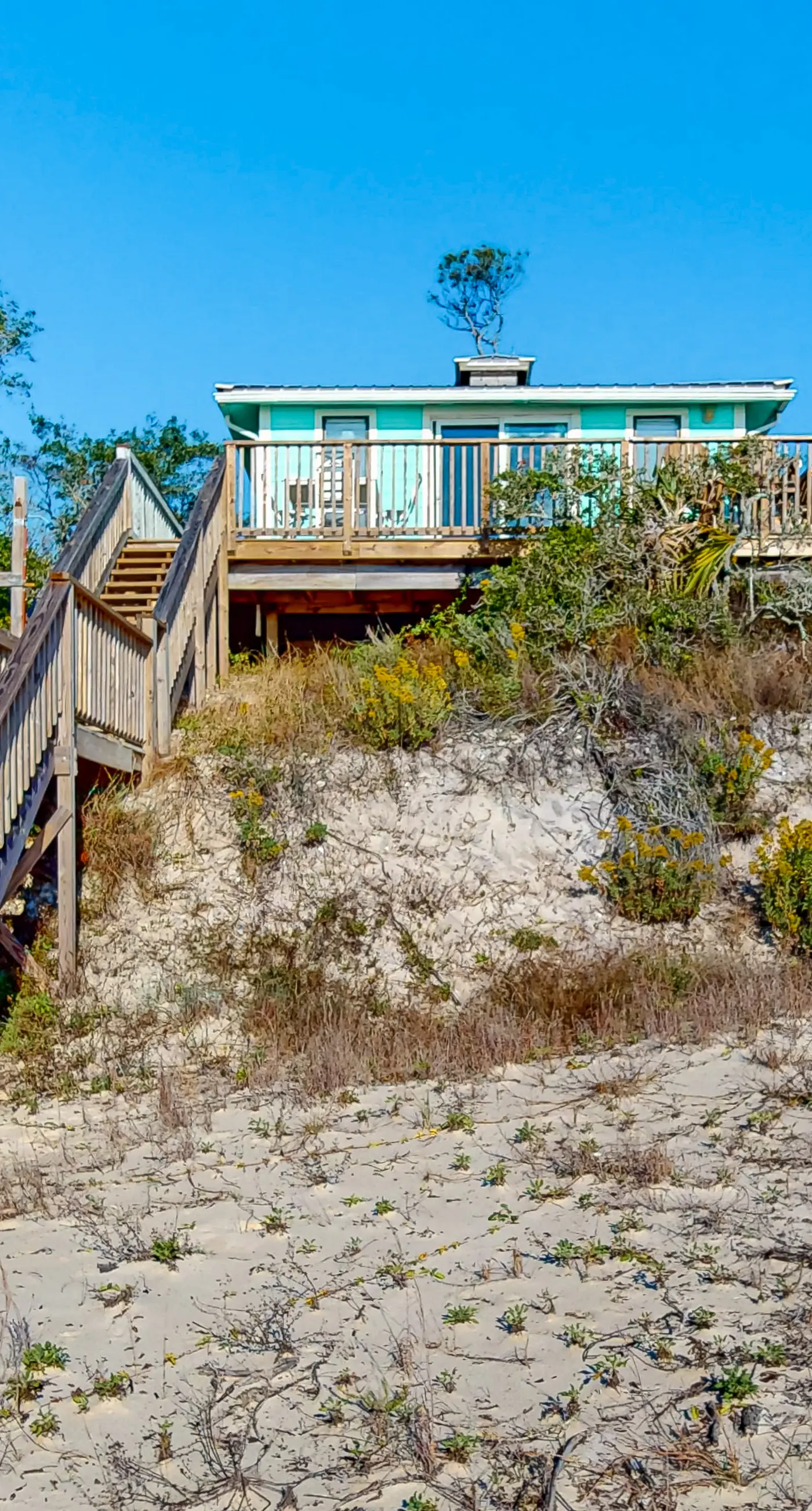 Beachfront dune cottage with deck & view of St Vincent Island