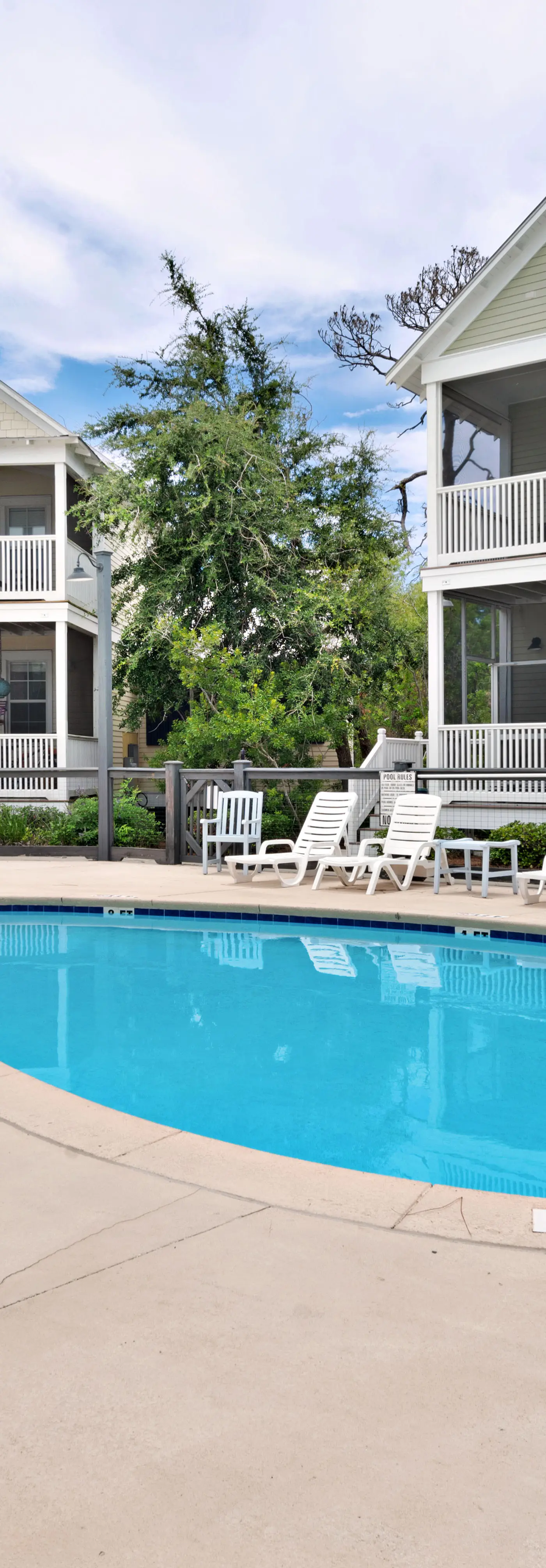 Beautiful home in a gated community with porches & shared pool,hot tub