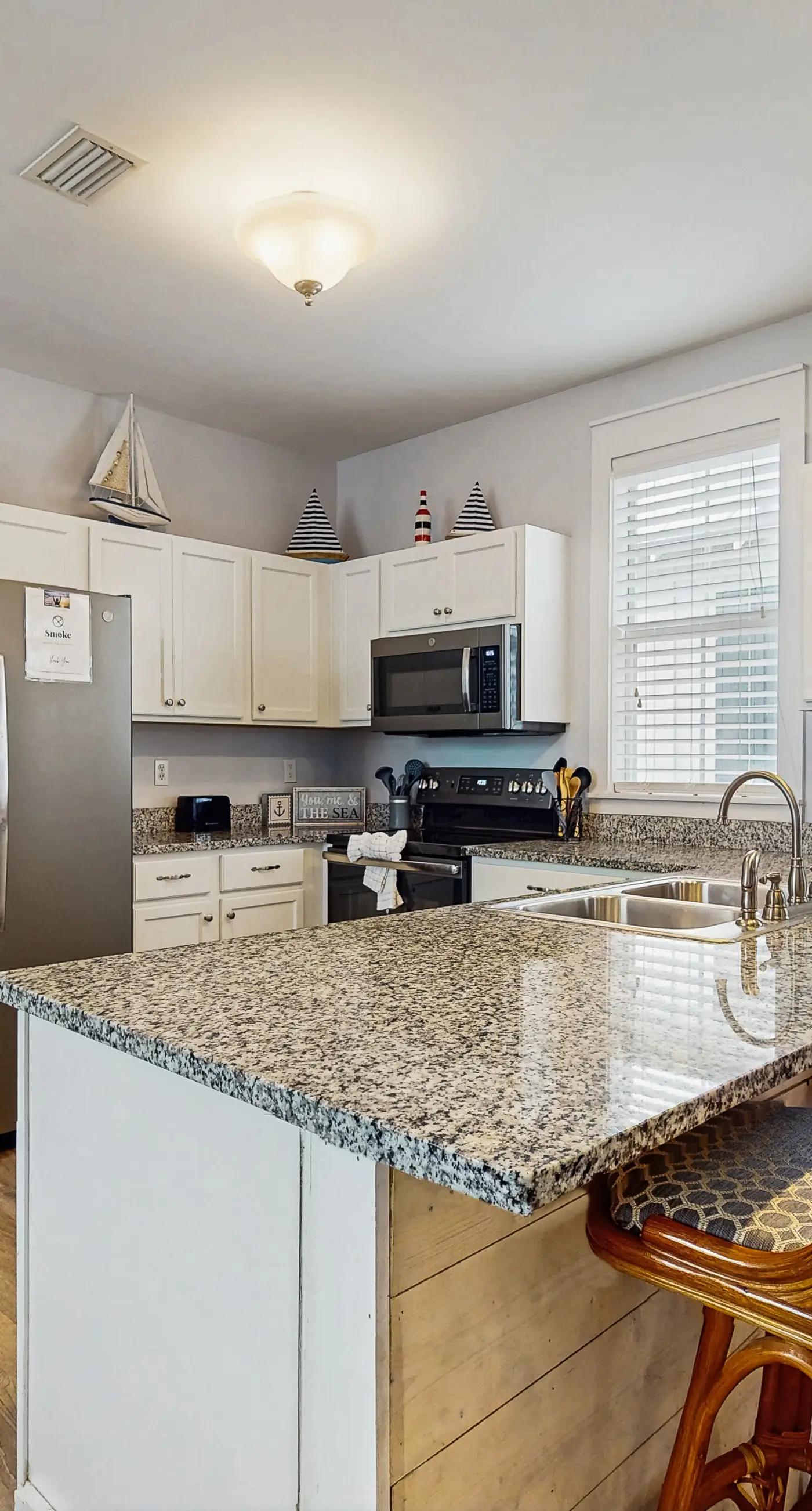 Beautiful home in a gated community with porches & shared pool,hot tub